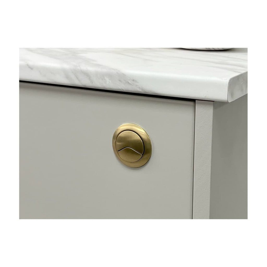 Sleek bathroom vanity with a marble countertop and gold circular drawer handle, combining modern design with functional storage. Perfect for elegant, contemporary bathrooms.