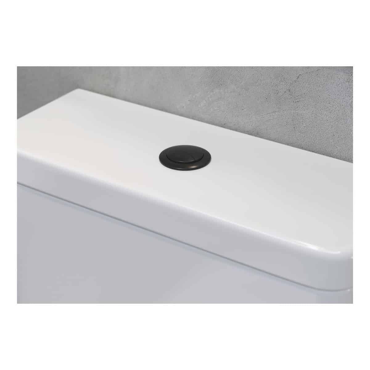 Premium white bathroom flush button with sleek black actuator, designed for modern plumbing fixtures, durable and easy to operate for a stylish and functional bathroom upgrade.