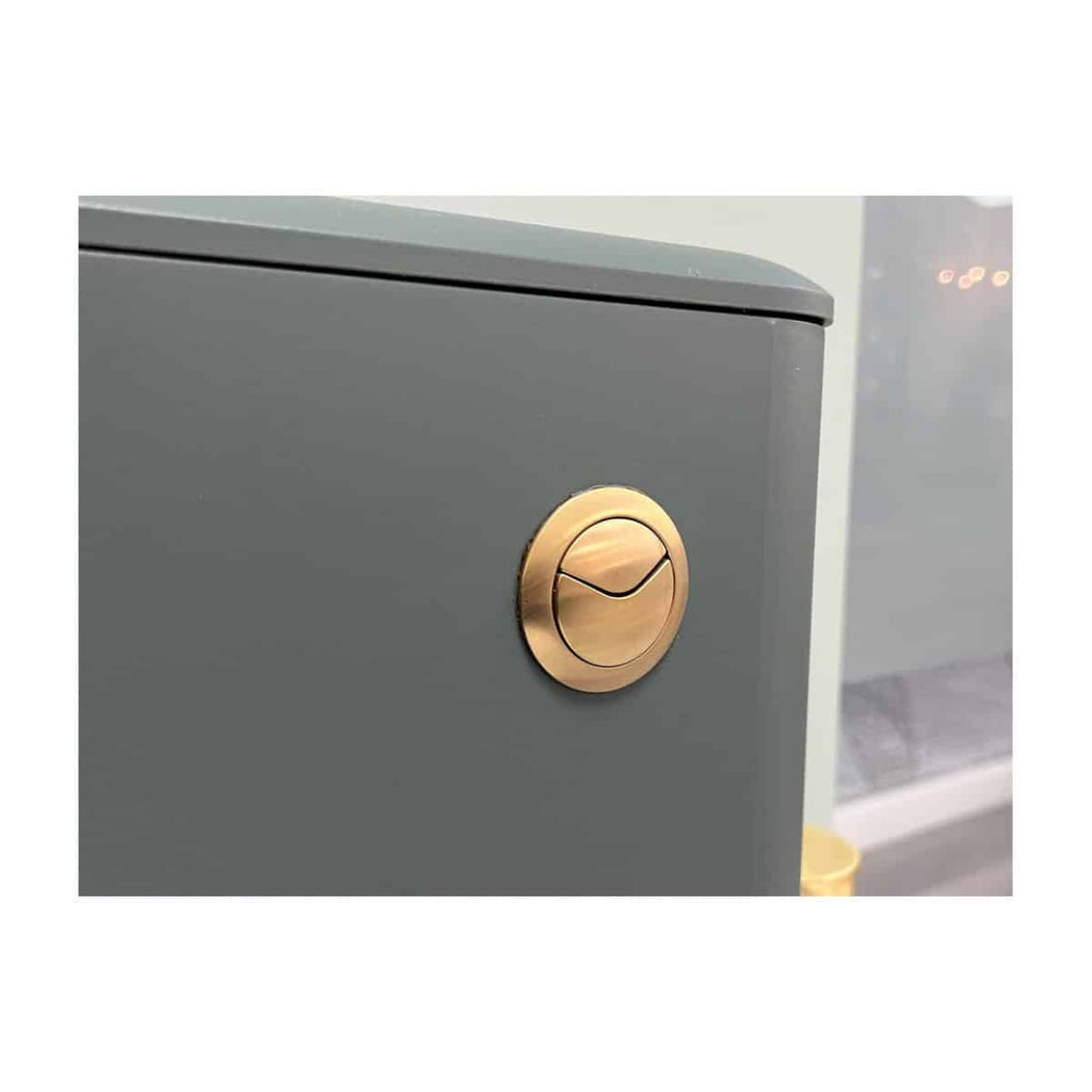 Sleek grey metal bathroom cabinet with a stylish gold lock, modern design perfect for bathroom storage solutions. Durable and elegant finish suitable for contemporary bathroom interiors.