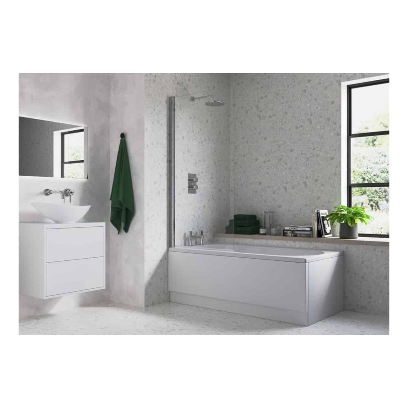 A modern bathroom featuring a sleek bathtub next to a large window, with a minimalist vanity and vessel sink, accented by green towels and a potted plant for a fresh, contemporary look.