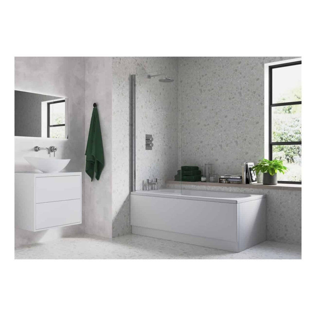 Sleek modern bathroom with white bathtub, green towel, large window with greenery view, minimalistic vanity, and decorative plants creating a fresh, contemporary bathroom design.