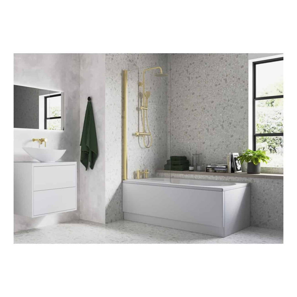 Modern bathroom with white bathtub, gold fixtures, black-framed windows, natural light, grey textured walls, green plant, and minimalist decor, showcasing luxurious and stylish bathroom design.