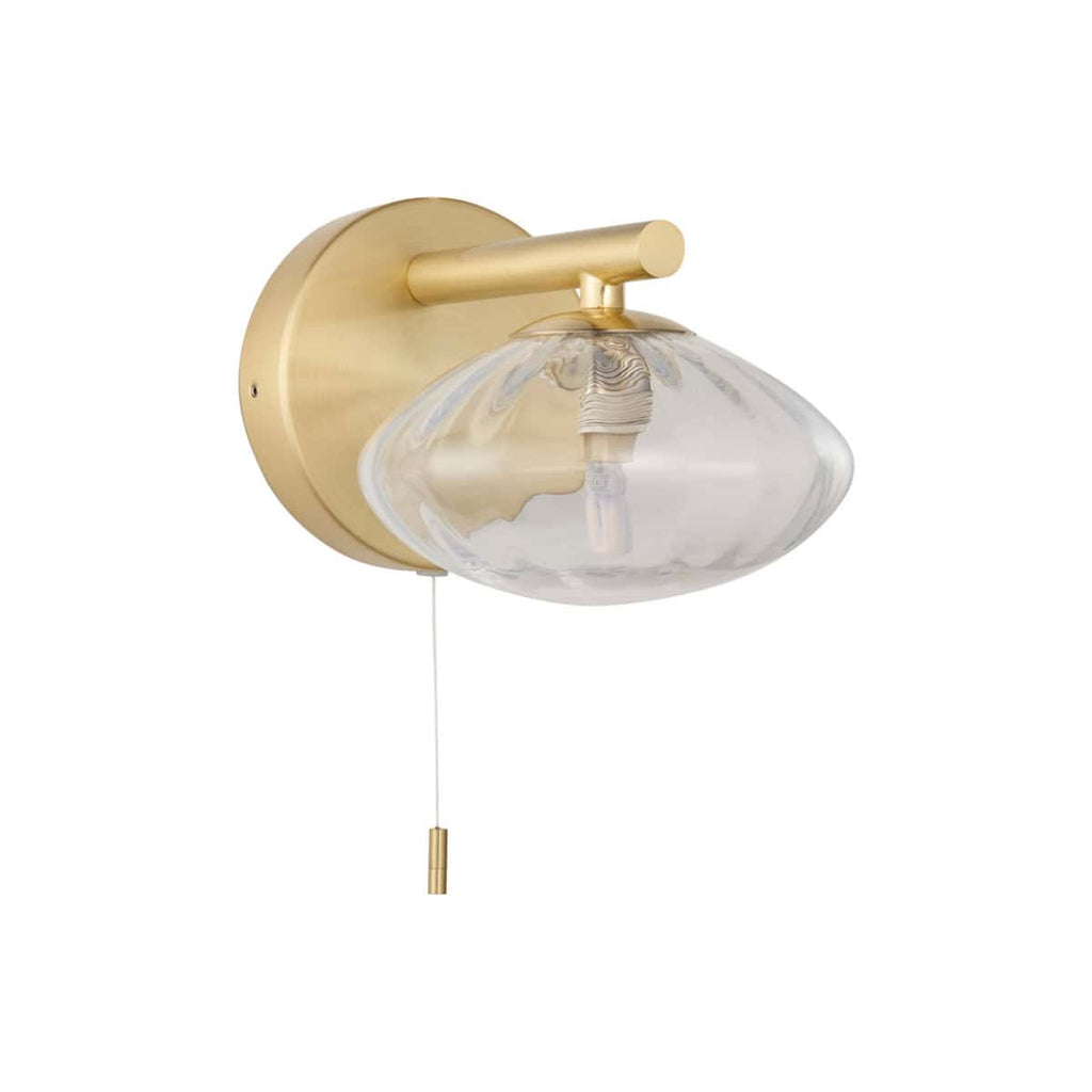 Elegant brass wall-mounted bathroom light with a clear, curved glass shade, ideal for modern renovations and enhancing bathroom lighting aesthetics.