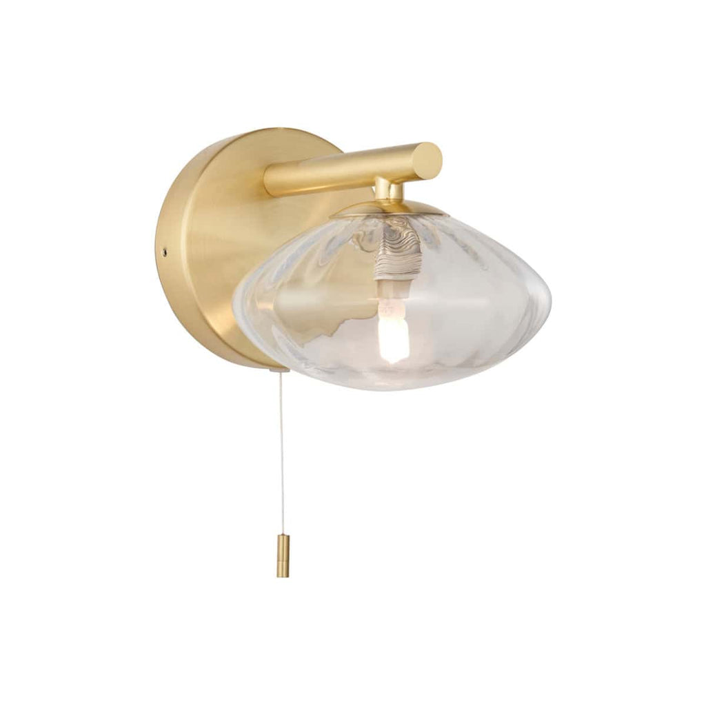 Elegant modern bathroom wall light with brass finish and clear glass shade, ideal for contemporary bathroom decor lighting. Perfect for enhancing ambient lighting in bathrooms.