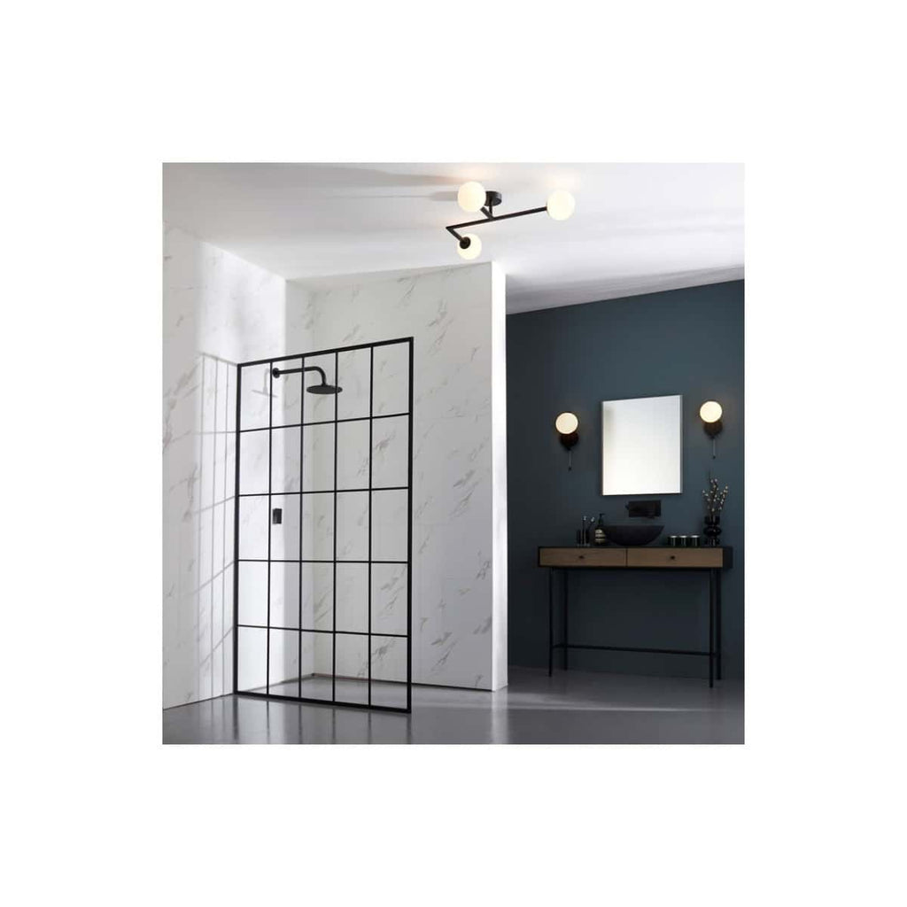 Modern shower enclosure with black metal frame and white marble wall panels in stylish Bubly Bathrooms interior.