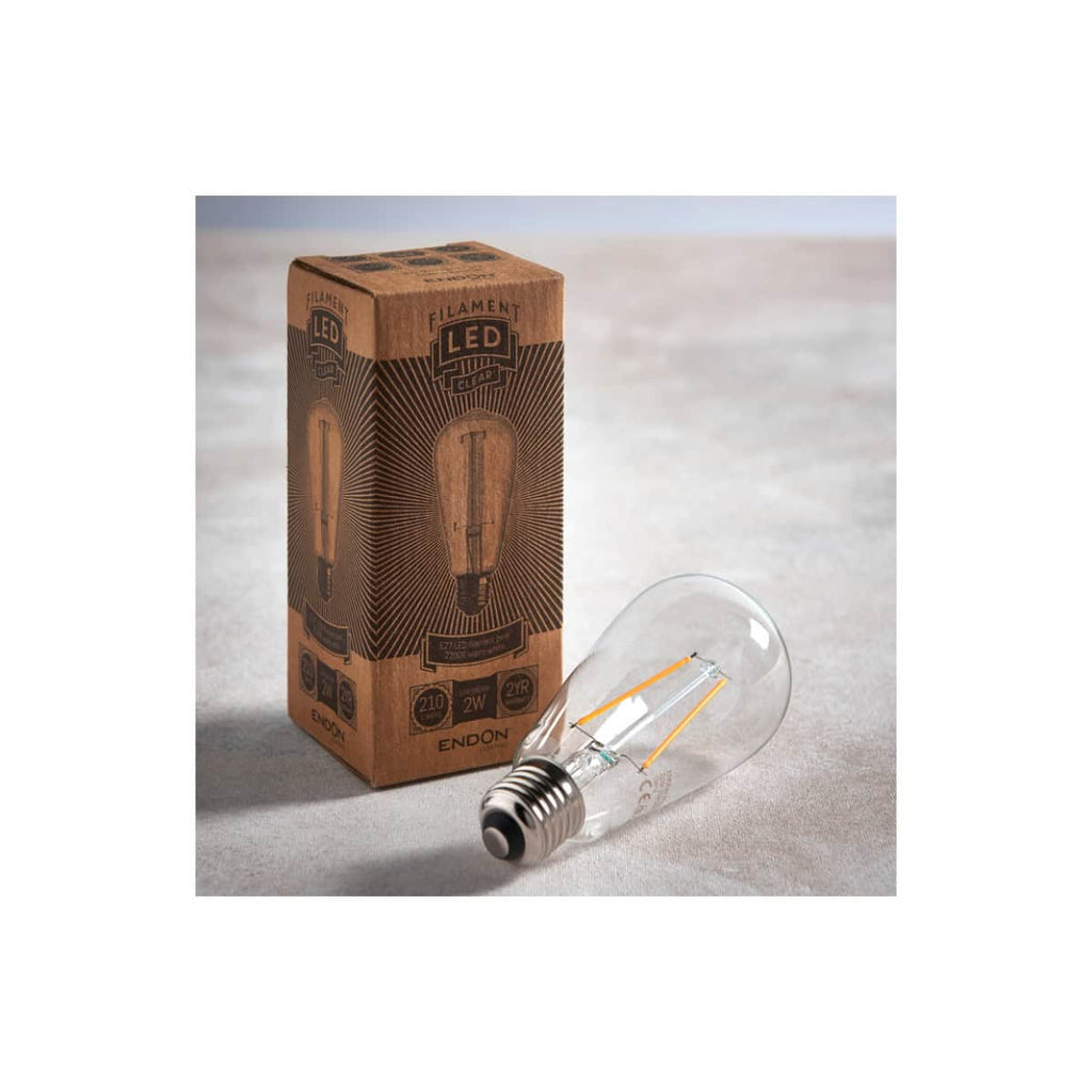 Vintage LED filament light bulb with packaging displaying eco-friendly features for bathroom renovation, highlighting energy-efficient LED lighting solutions.