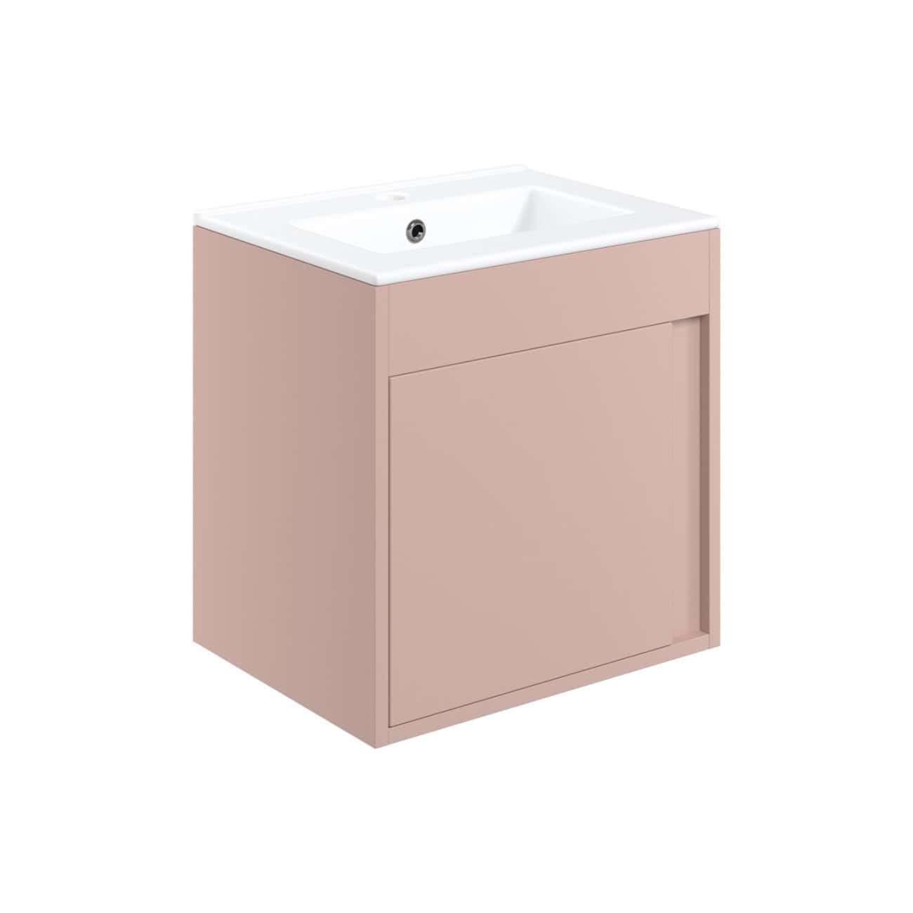 Modern blush pink bathroom vanity with integrated ceramic sink, minimalist design, ideal for contemporary bathrooms, featuring clean lines and ample storage space.