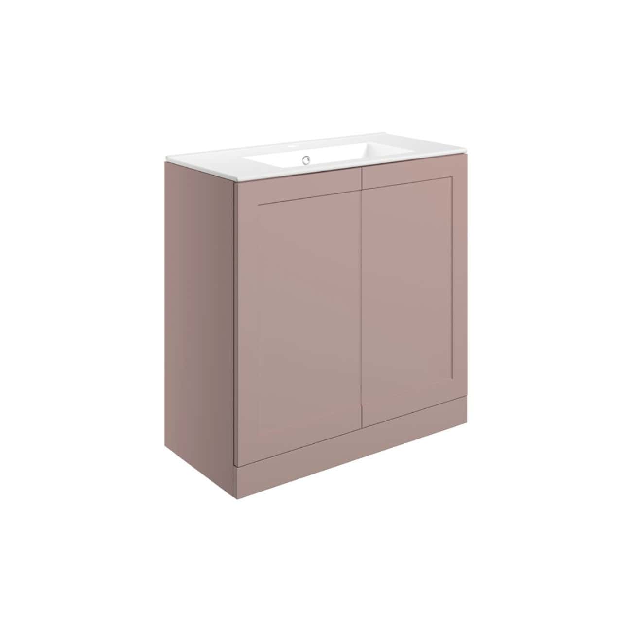 Modern blush pink bathroom vanity with integrated sink, sleek cabinet doors, and minimalist design for contemporary bathrooms.