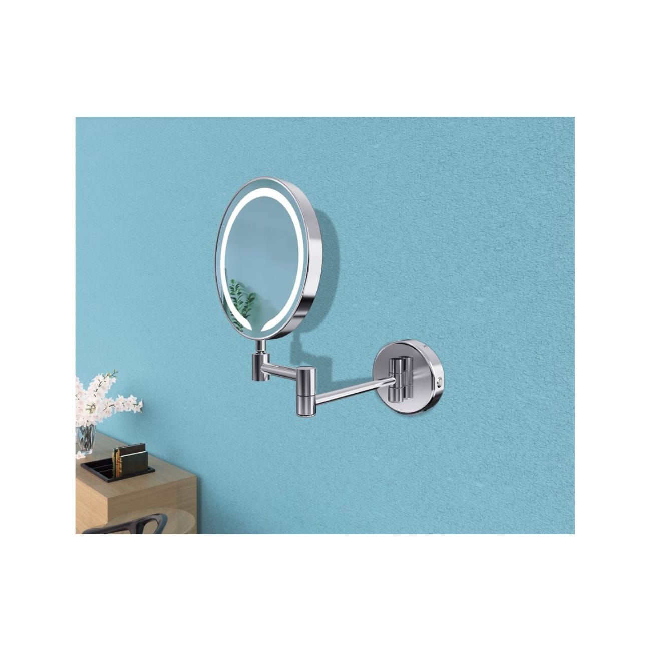 Round chrome wall-mounted vanity mirror with extendable arm on a light blue textured bathroom wall.