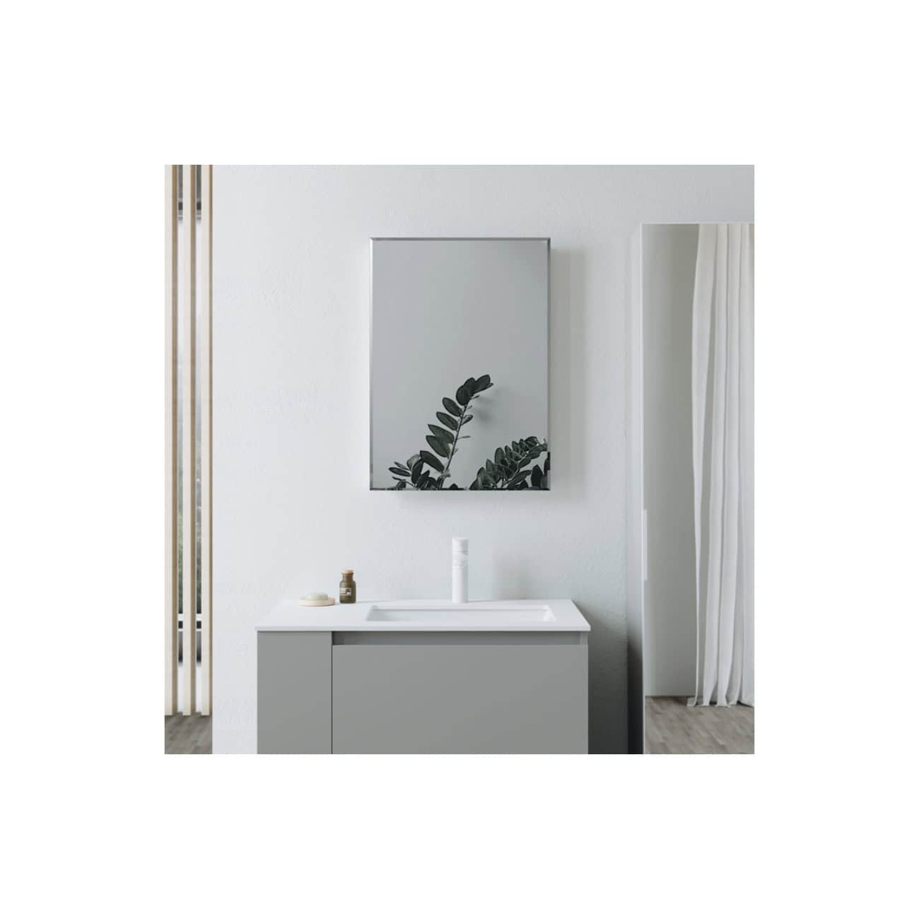 Modern minimalist bathroom vanity with a sleek grey cabinet and white sink, complemented by a large wall mirror and elegant decor, designed for contemporary stylish bathrooms.
