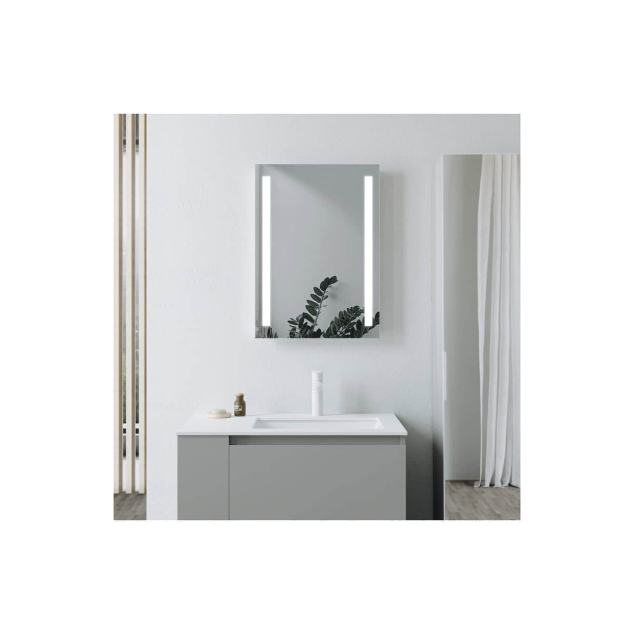 Sleek modern bathroom vanity with integrated sink, minimalist design, and a stylish mirror with LED lighting, perfect for contemporary bathroom decor.