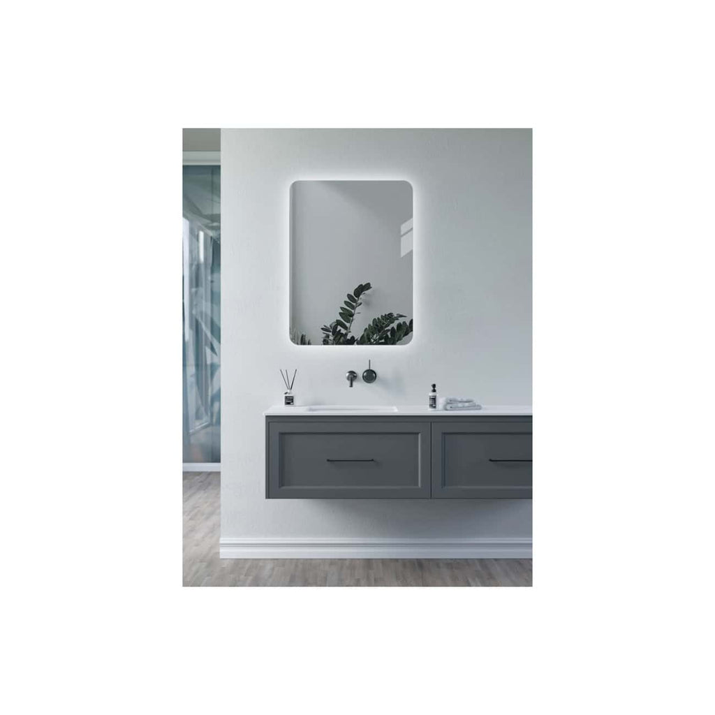 Modern bathroom vanity with a rectangular mirror, grey cabinetry, white countertop, and minimalist décor, highlighting contemporary bathroom design ideas.