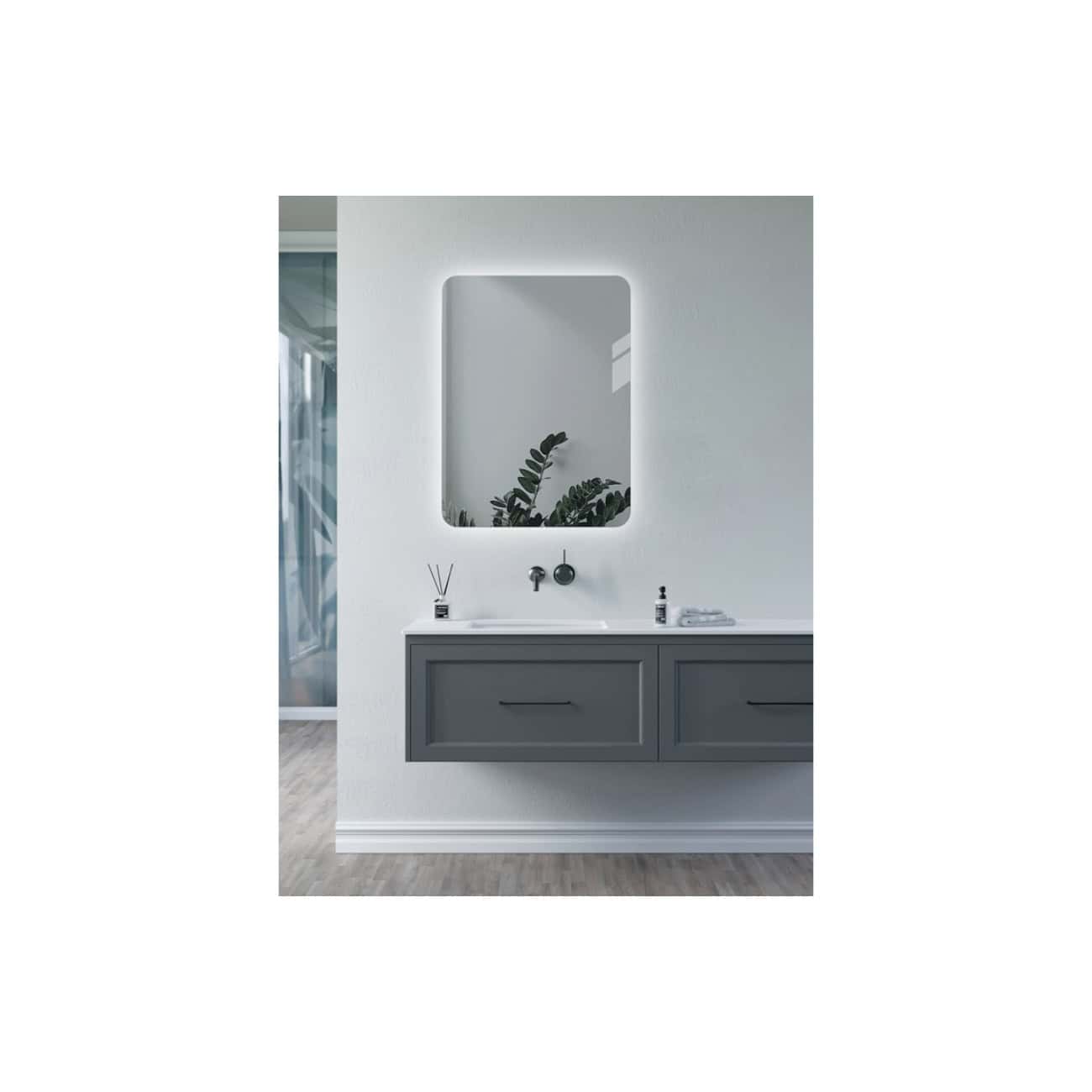 Modern bathroom vanity with a rectangular mirror, grey cabinetry, white countertop, and minimalist décor, highlighting contemporary bathroom design ideas.