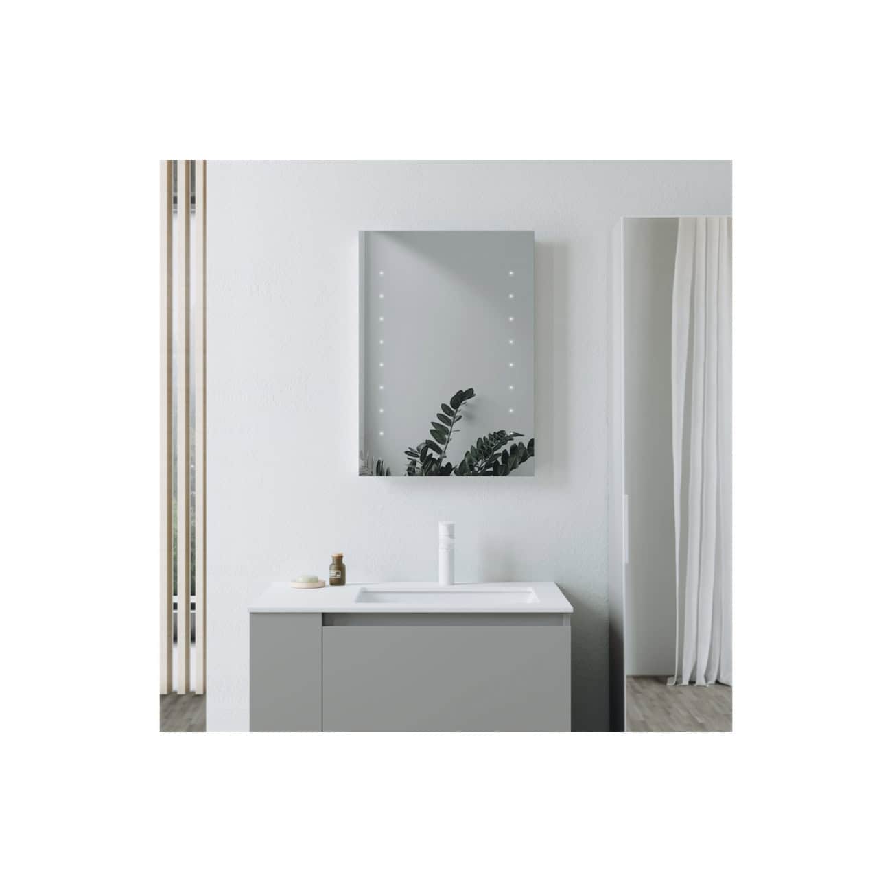 Sleek modern bathroom vanity with a large mirror, minimalist design, and neutral colour palette; perfect for contemporary home bathroom decor.