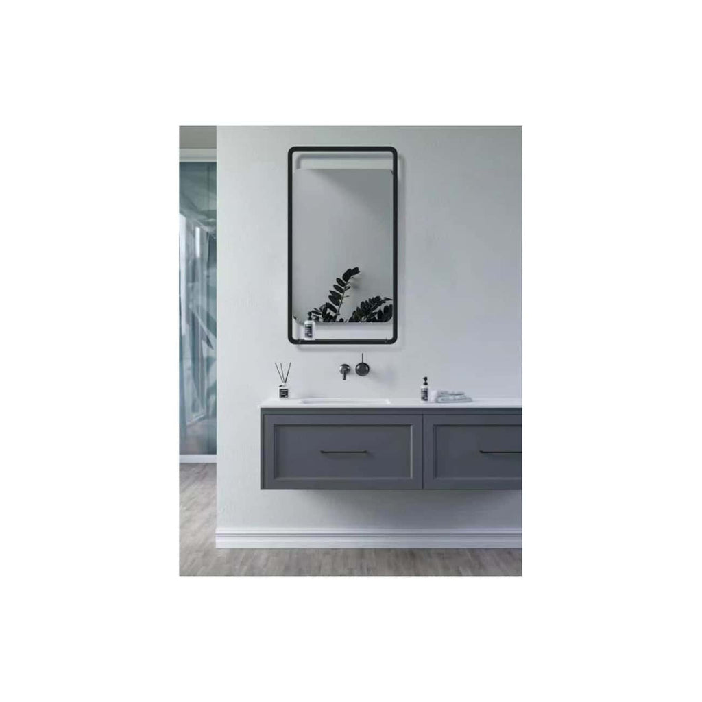 Modern bathroom vanity with a sleek grey floating cabinet, a white countertop, stylish black framed mirror, and minimal accessories, creating a contemporary and functional space.