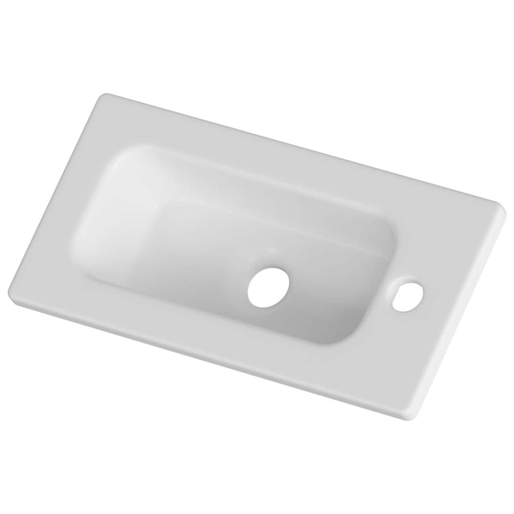 Porcelain bathroom sink with oval basin and single faucet hole, modern design, white finish, ideal for contemporary bathroom decor.