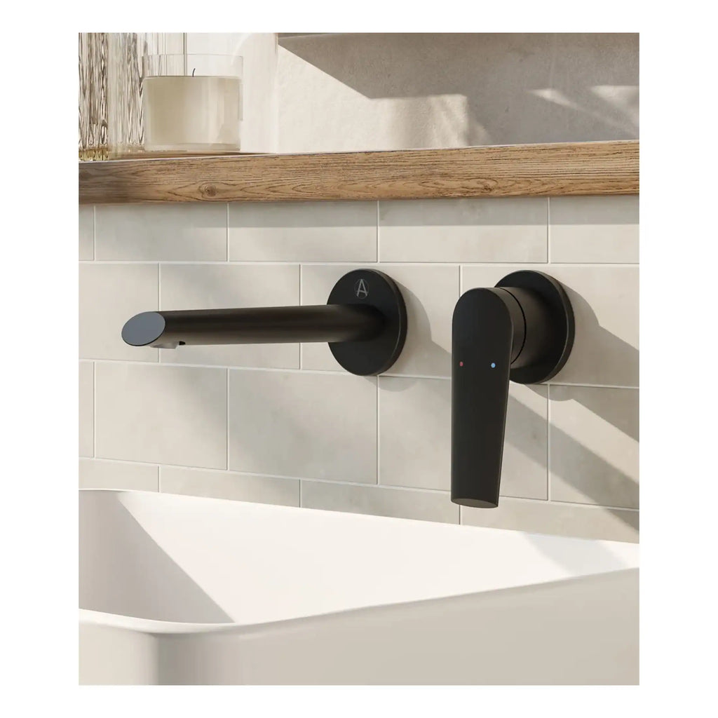 Sleek black bathroom mixer tap with matching digital control, modern style for contemporary bathroom design, high-quality fixtures from Bubly Bathrooms.