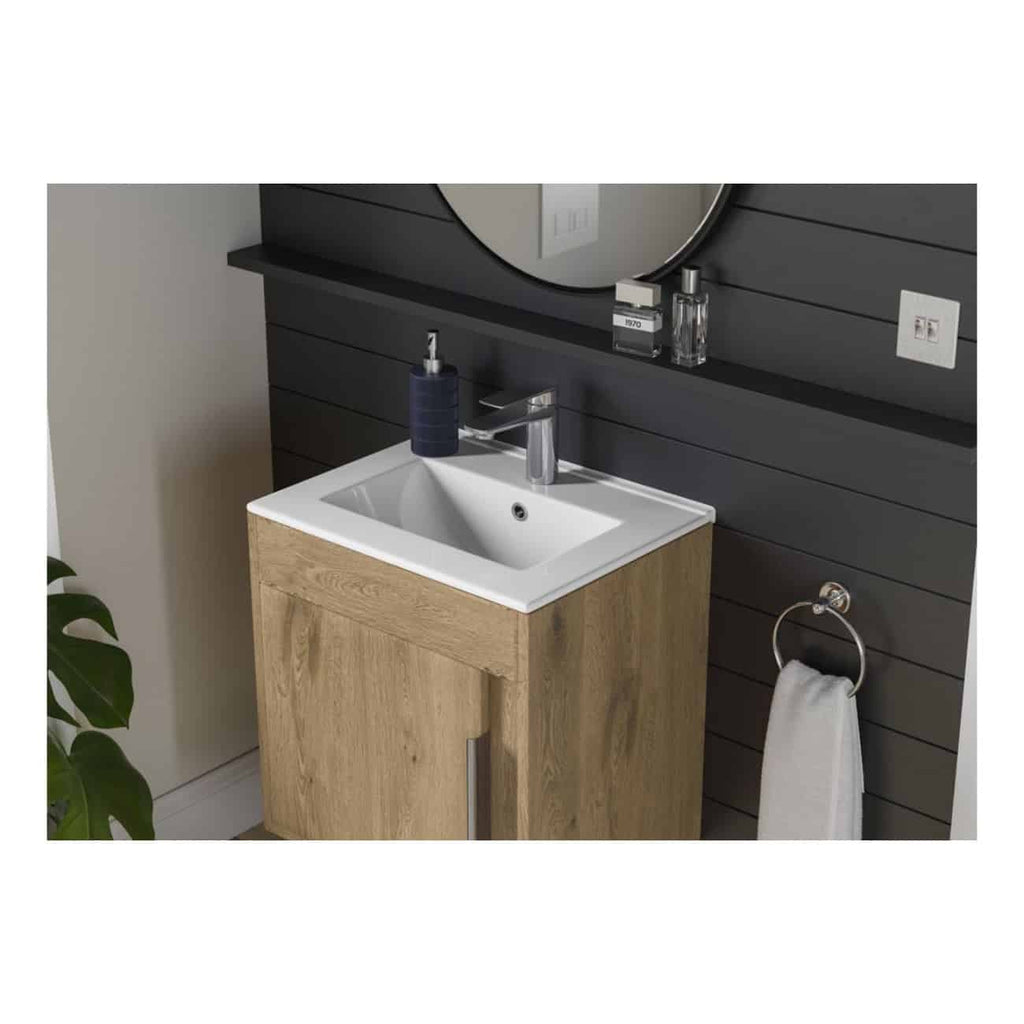 Sleek bathroom vanity with modern sink, wooden cabinet, and black wall panel; features a mirror, towel ring, and bathroom essentials for stylish bathroom design.