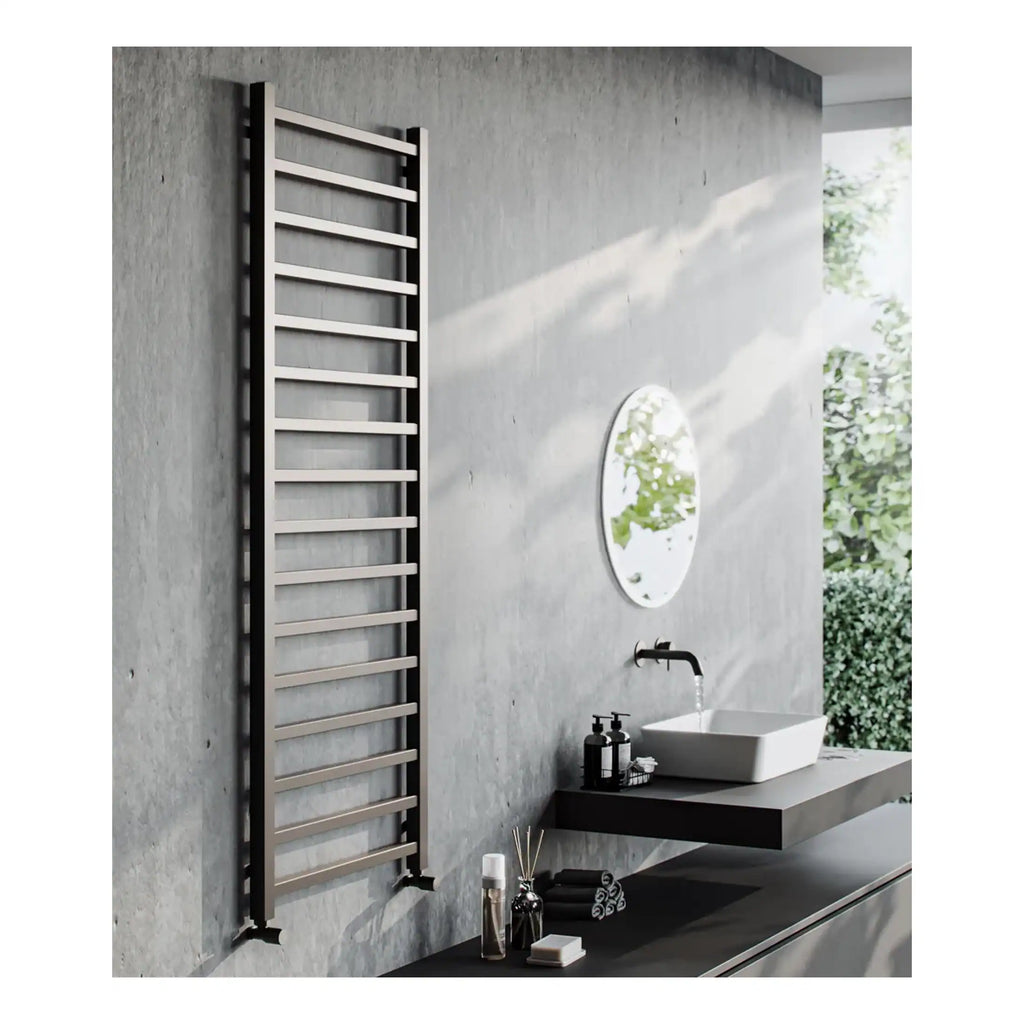 Stylish modern towel radiator on a concrete wall in contemporary bathroom with sleek sink and minimalist decor. Ideal for heating and drying towels in a stylish bathroom setting.