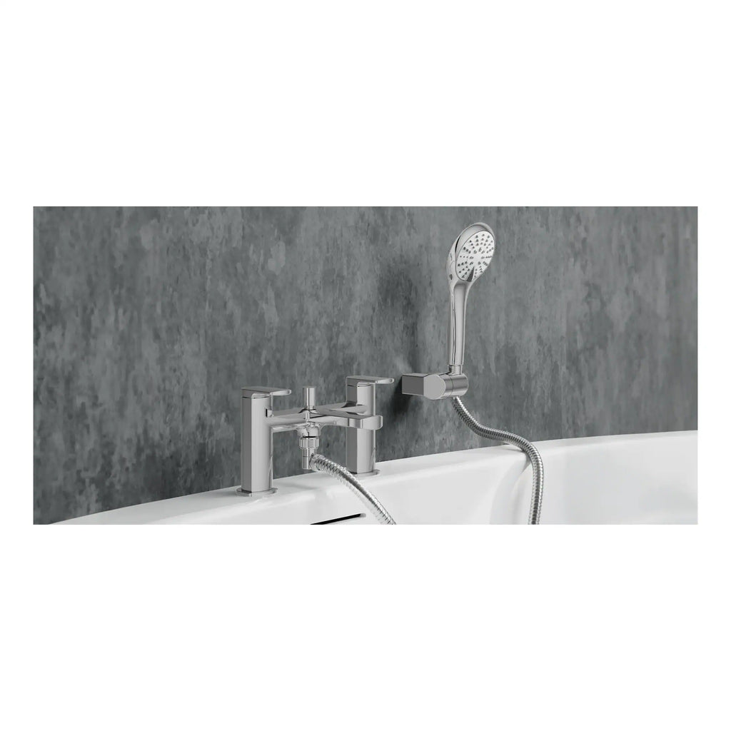 Sleek modern chrome bathroom tap with handheld shower attachment installed on a white bathtub, featuring a contemporary design for stylish bathroom fixtures.