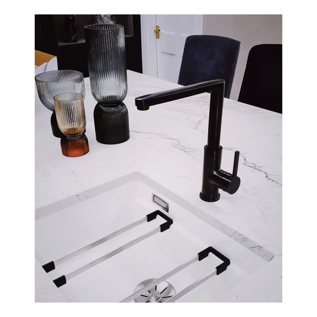 Sleek black kitchen sink tap with pull-out spray and modern design, perfect for contemporary bathroom or kitchen renovations.
