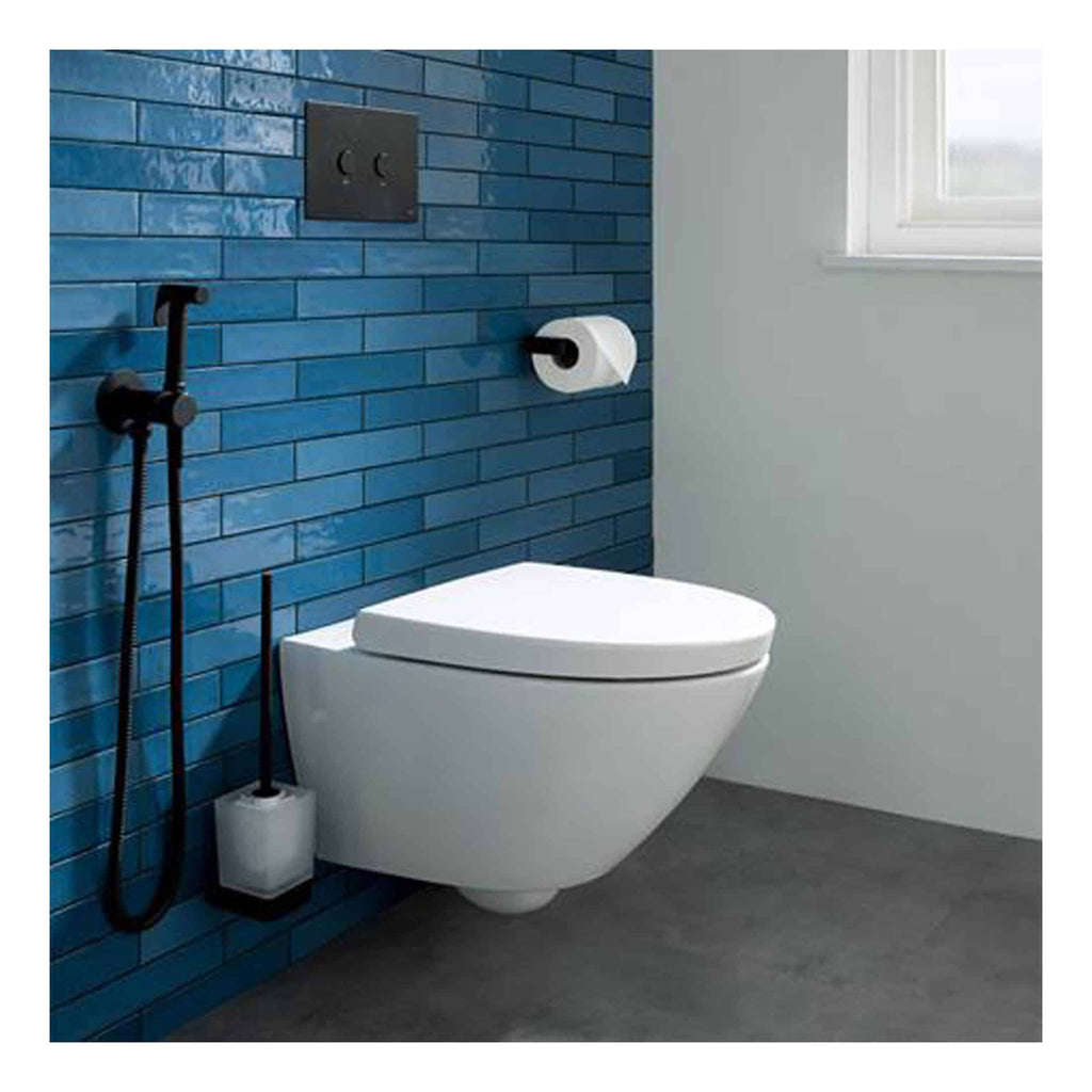Sleek modern wall-mounted toilet with a blue tiled accent wall and black flush buttons, ideal for contemporary bathrooms. Featuring a black bidet spray and a toilet paper holder for added convenience.