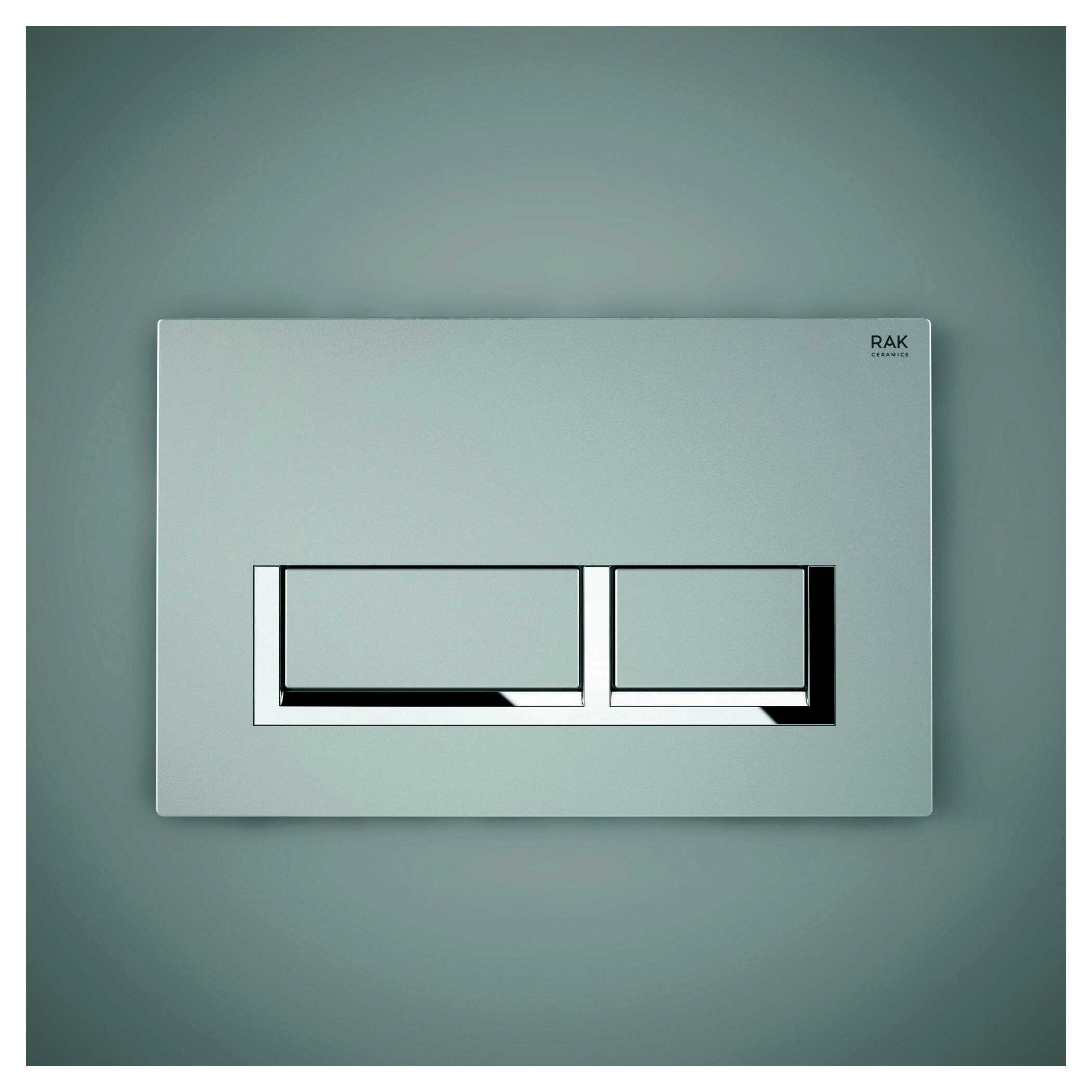 Clean modern toilet flush plate from Bubly Bathrooms with sleek chrome and matte finish, ideal for contemporary bathroom renovations and fixtures.
