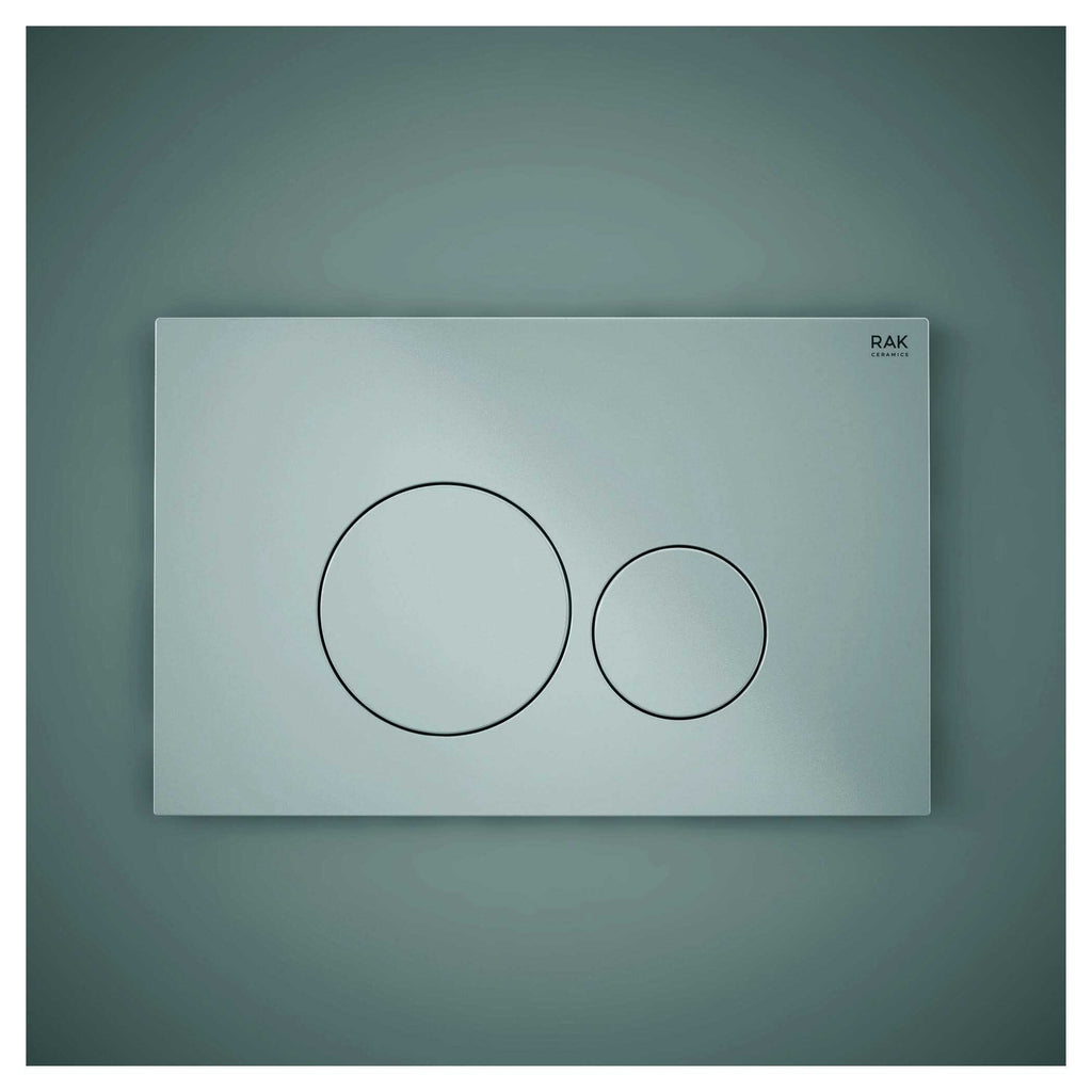 Sleek modern concealed dual flush toilet buttons in matte black finish on a grey flush plate for contemporary bathroom design.