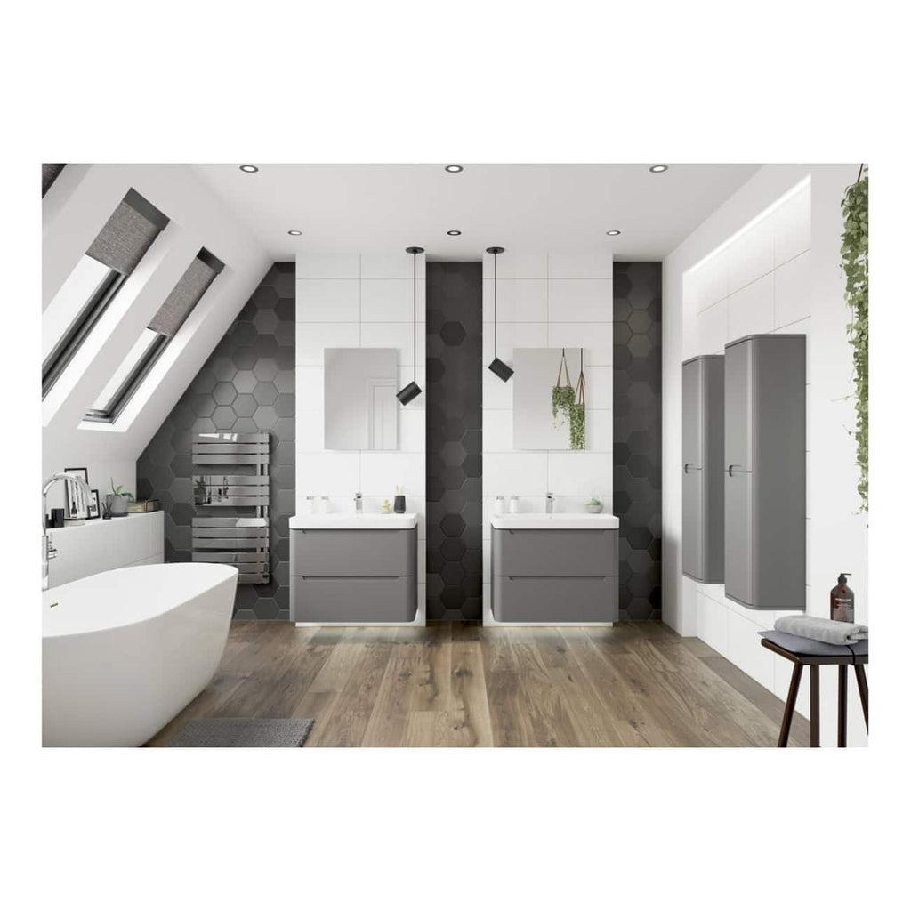 Contemporary bathroom featuring a freestanding bathtub, dual grey vanities with round mirrors, modern pendant lights, hexagonal wall tiles, and sleek wall-mounted storage cabinets, perfect for a stylish and functional bathroom design.