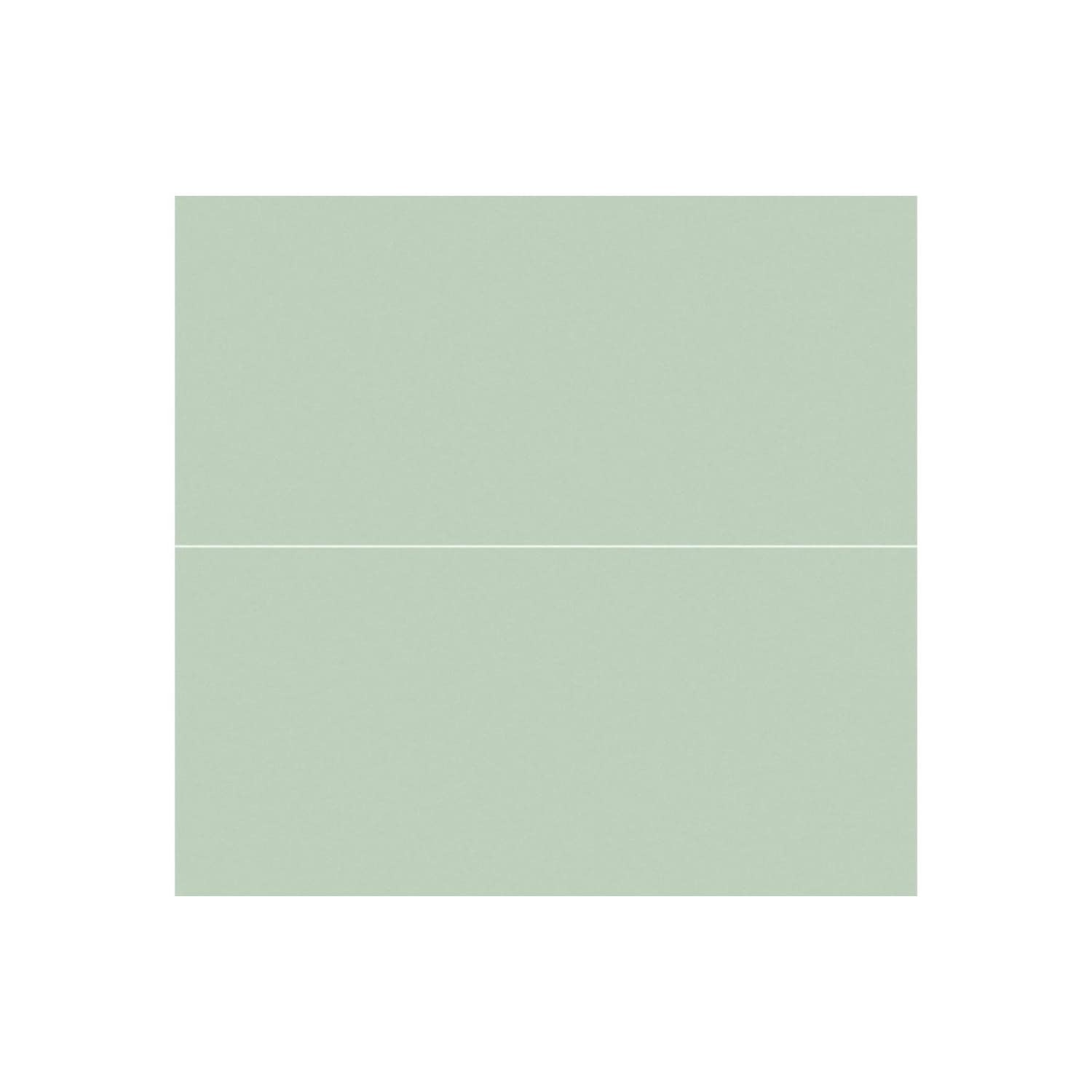 Light pastel green bathroom cabinet with sleek modern design, ideal for contemporary bathroom interiors, featuring minimalistic style and clean lines.