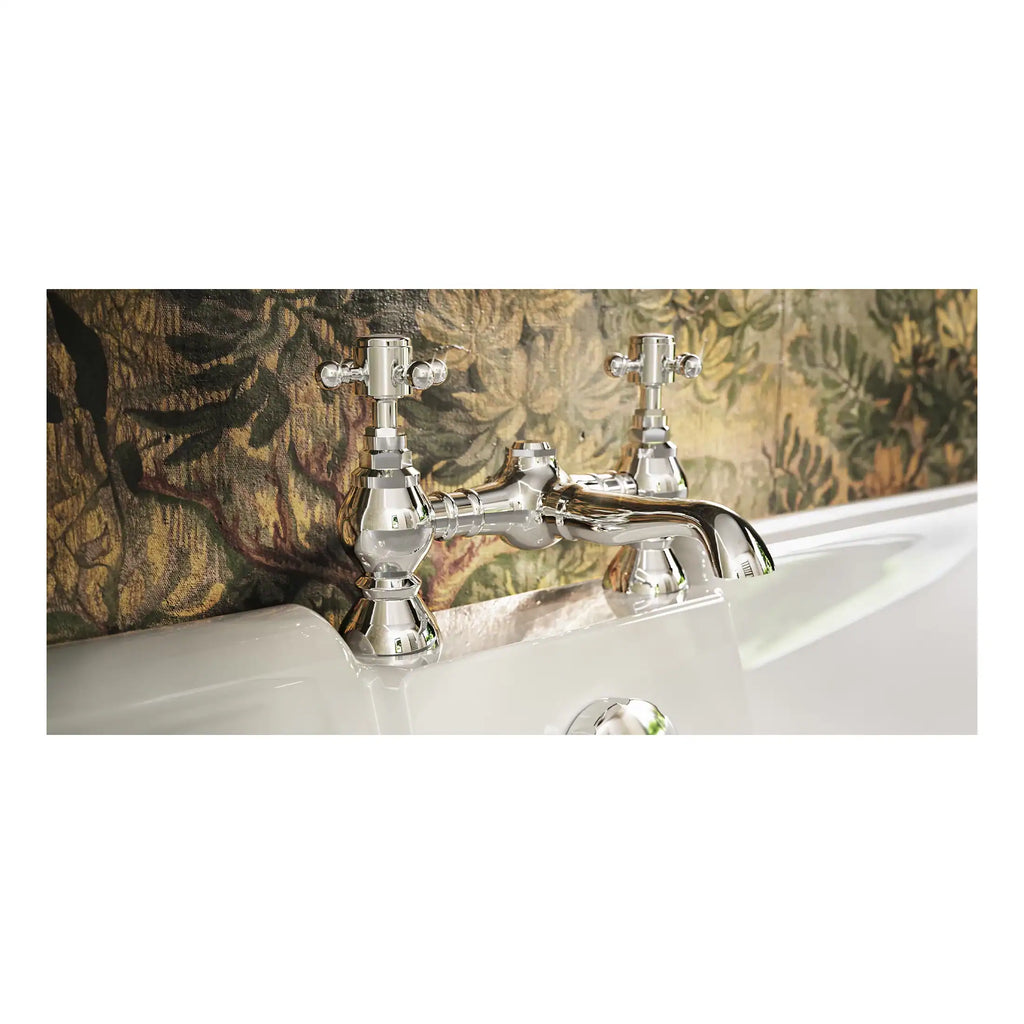 Shiny chrome bathroom tap and vintage-style faucet with a floral wallpaper background, designed for elegant bathroom fixtures and plumbing accessories.