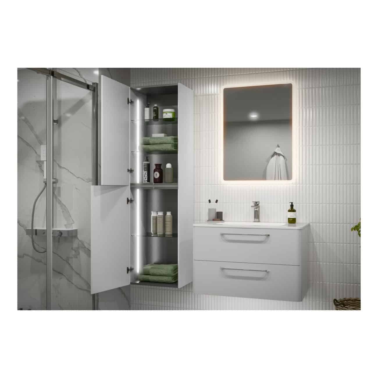 Sleek modern bathroom with illuminated mirror, minimalist white vanity with storage drawers, and a stylish open cabinet for toiletries and towels, creating a clean and functional space.