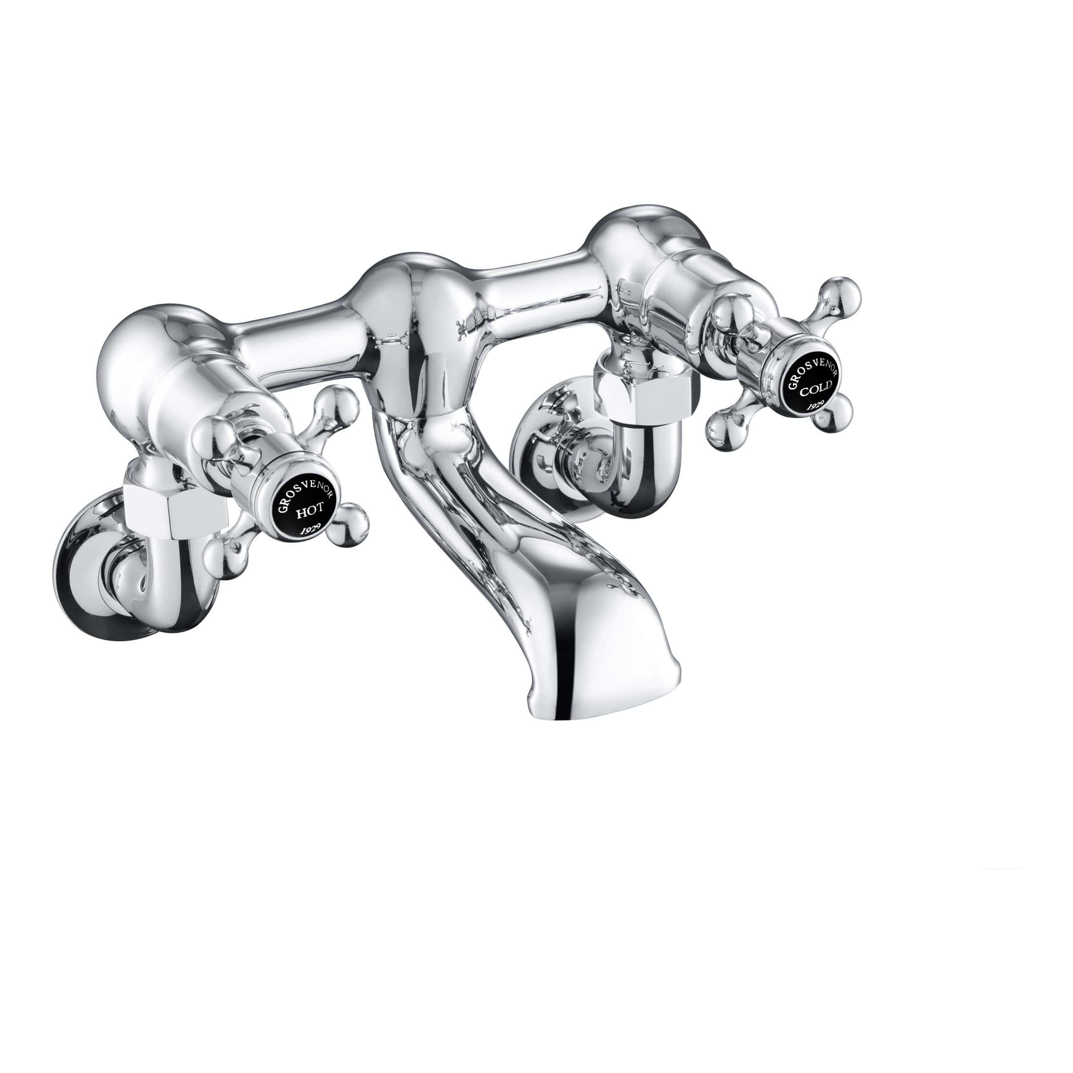 Chrome bathroom sink tap with hot and cold water controls, vintage-style fixture for classic bathroom design.