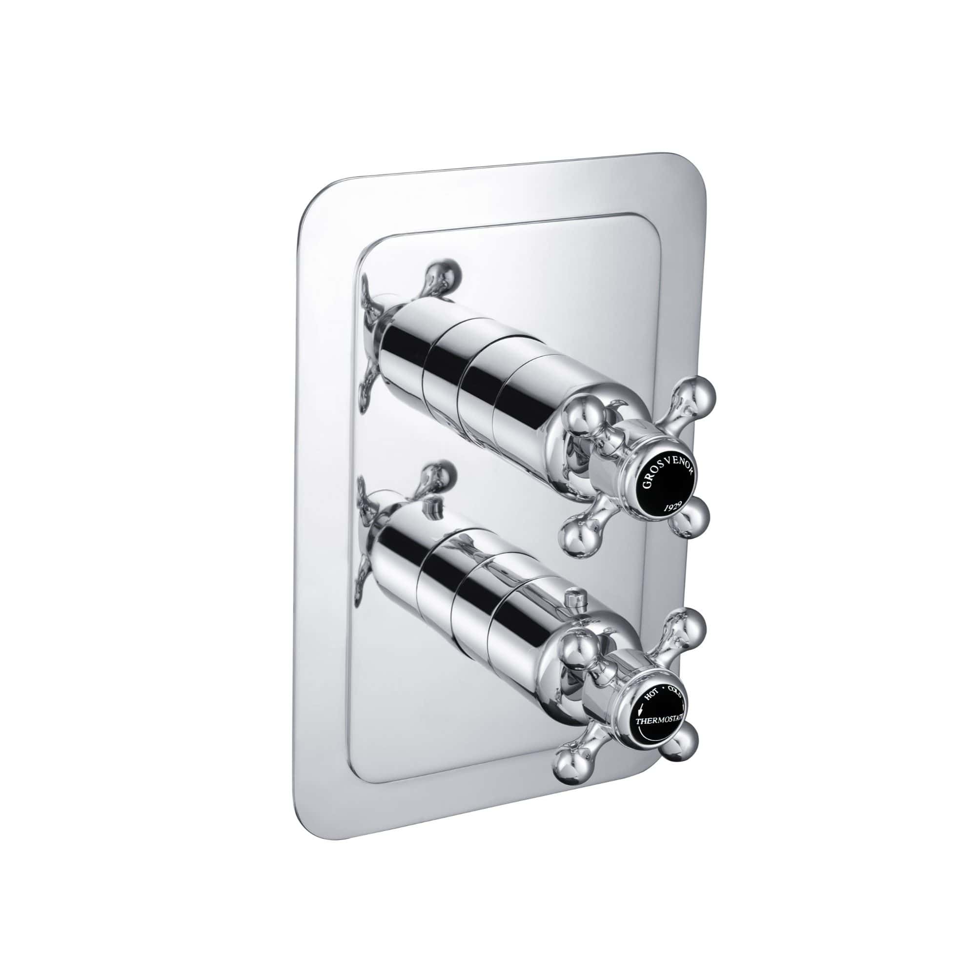 Polished chrome bathroom mixer tap with dual handles, modern design, suitable for contemporary bathrooms.