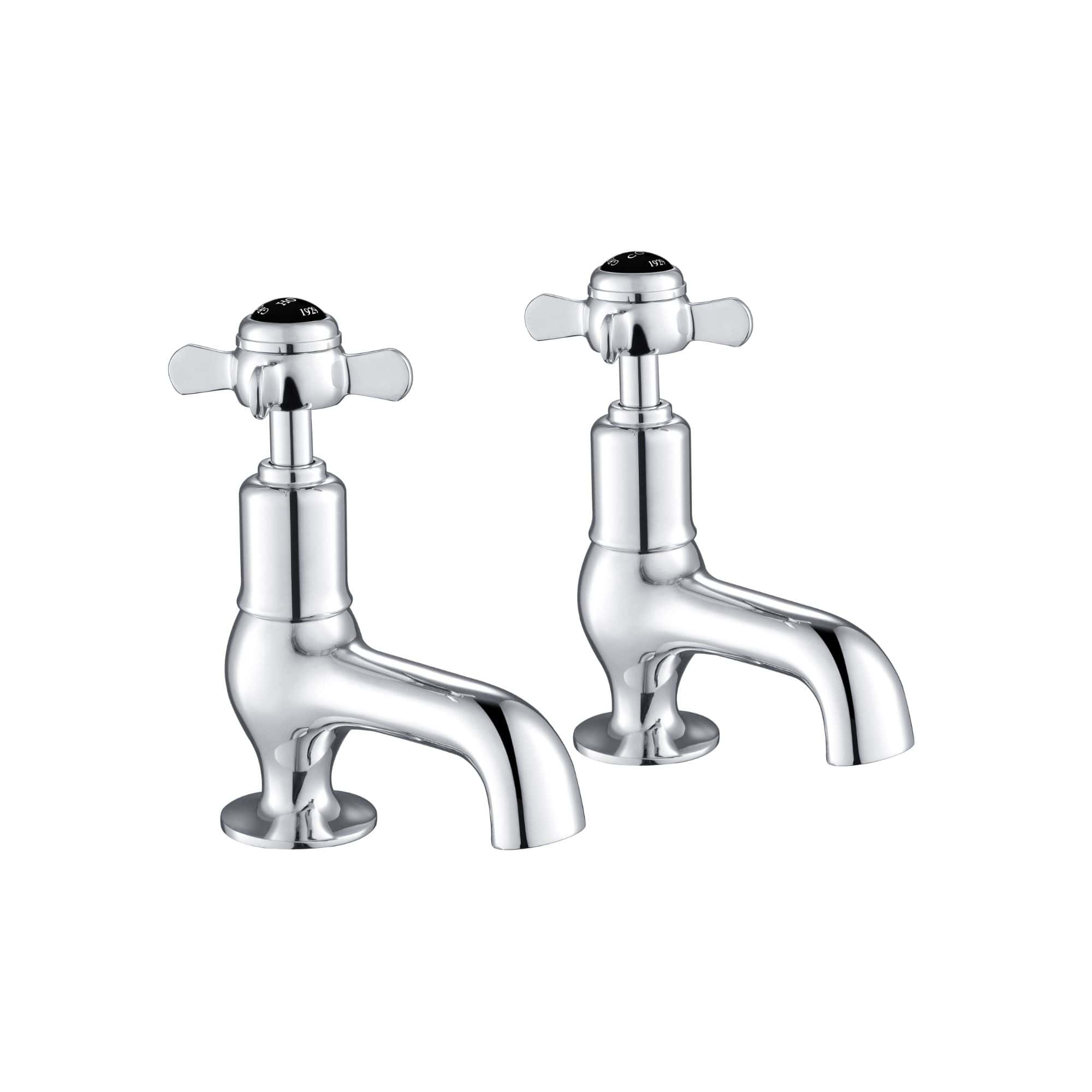 Shiny chrome bathroom taps, vintage style, dual cross handles, ideal for classic bathroom design, with a smooth finish for durability and elegance.