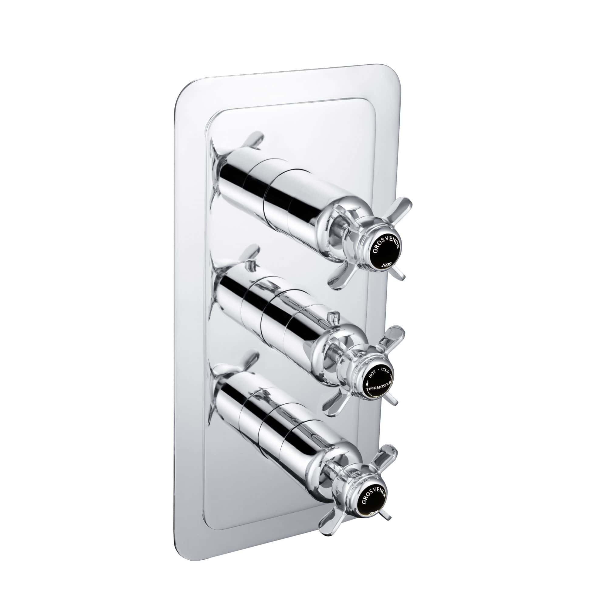 Shiny chrome bathroom thermostatic shower valve with three controls and black labels, modern design for precise temperature control and luxurious bathroom upgrade.
