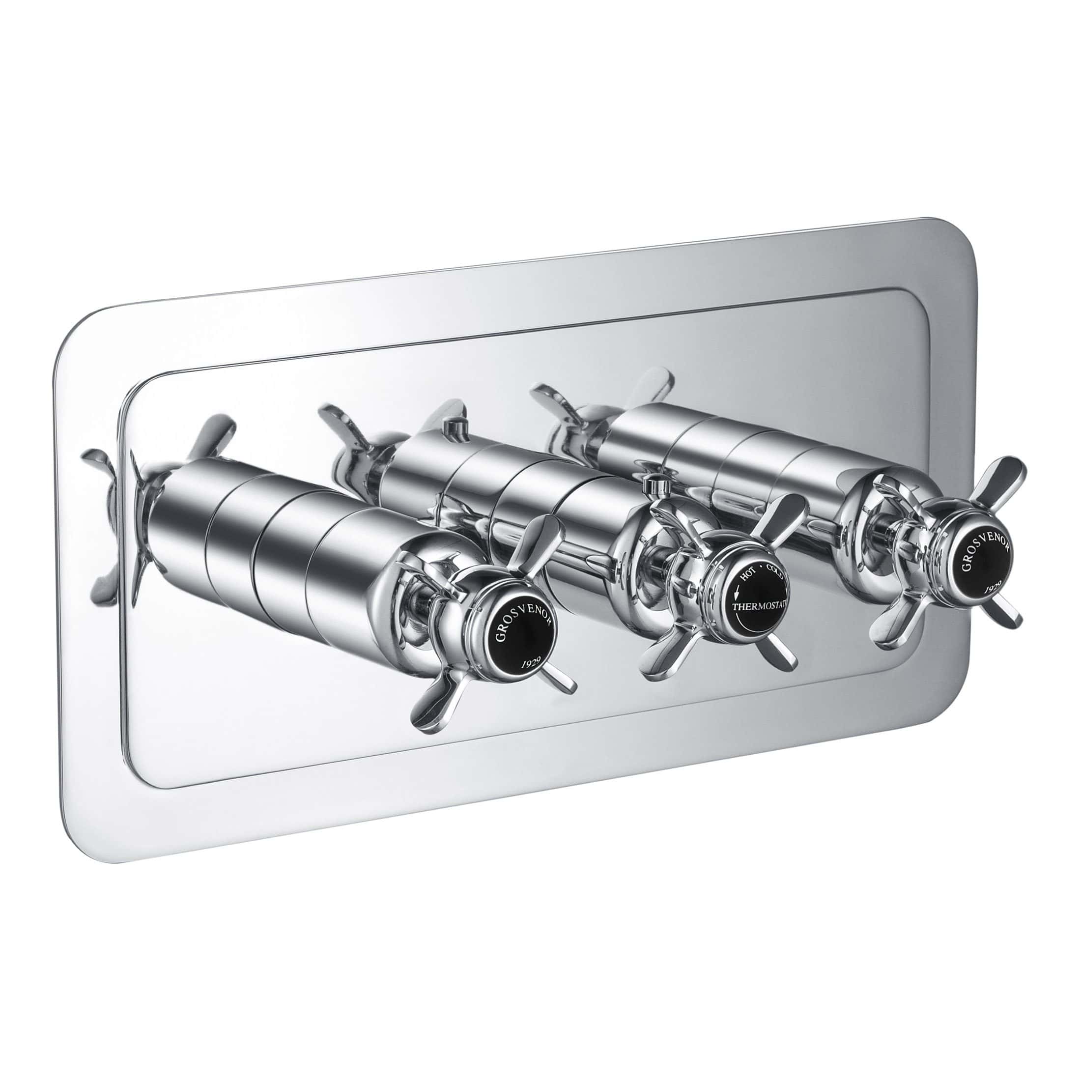 Shiny chrome thermostatic shower valve with three controls mounted on a white wall, modern bathroom fixtures for precise water temperature regulation.