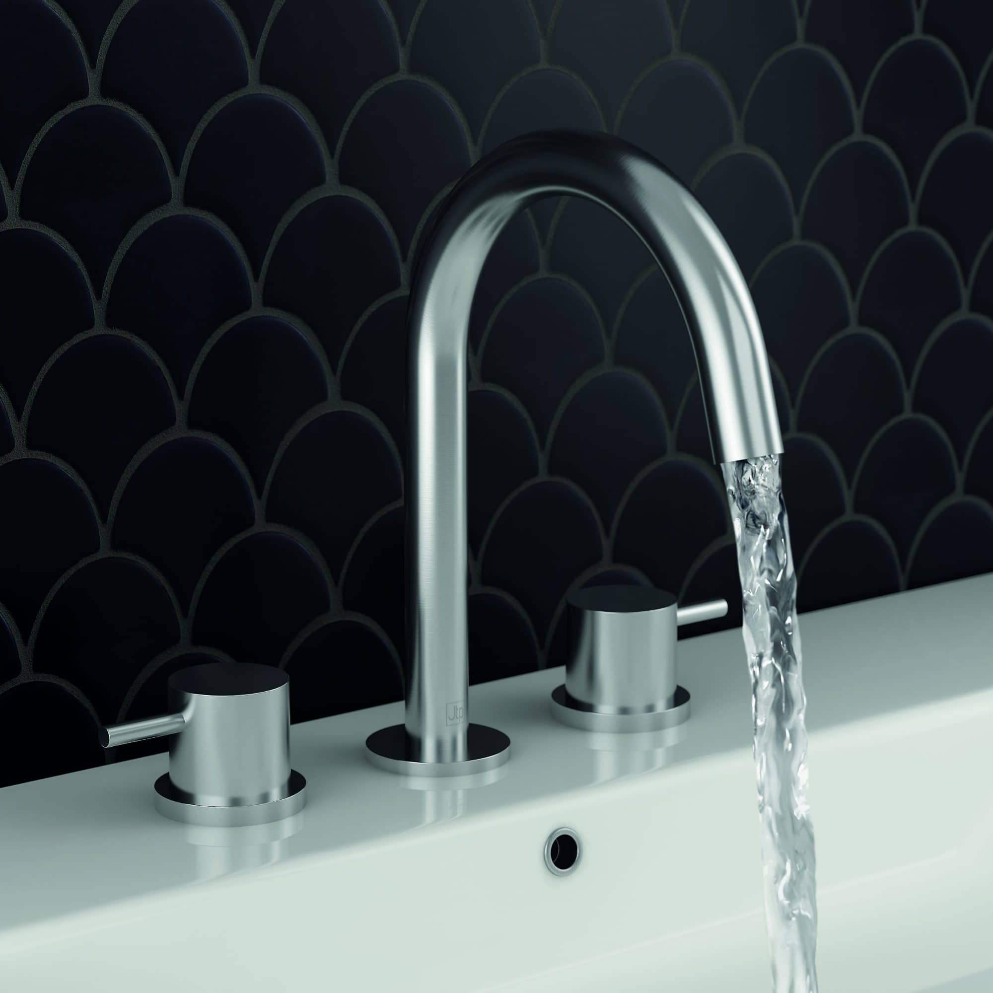 Sleek stainless steel kitchen tap with flowing water against dark tiled backsplash, ideal for modern bathroom or kitchen upgrades.