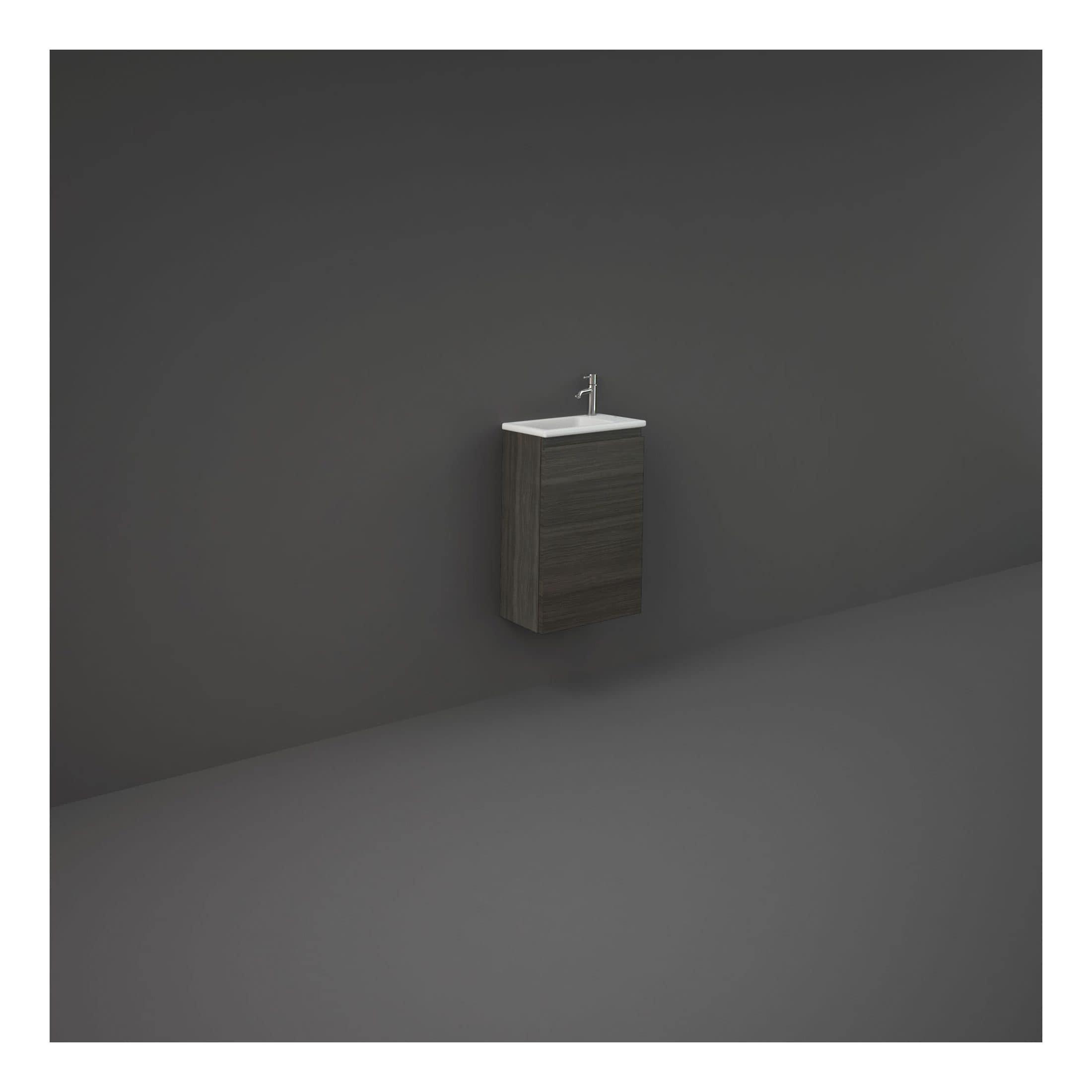 Sleek bathroom vanity with integrated sink and modern wooden finish, ideal for contemporary bathroom designs. Compact and minimalist, perfect for small or stylish bathrooms.