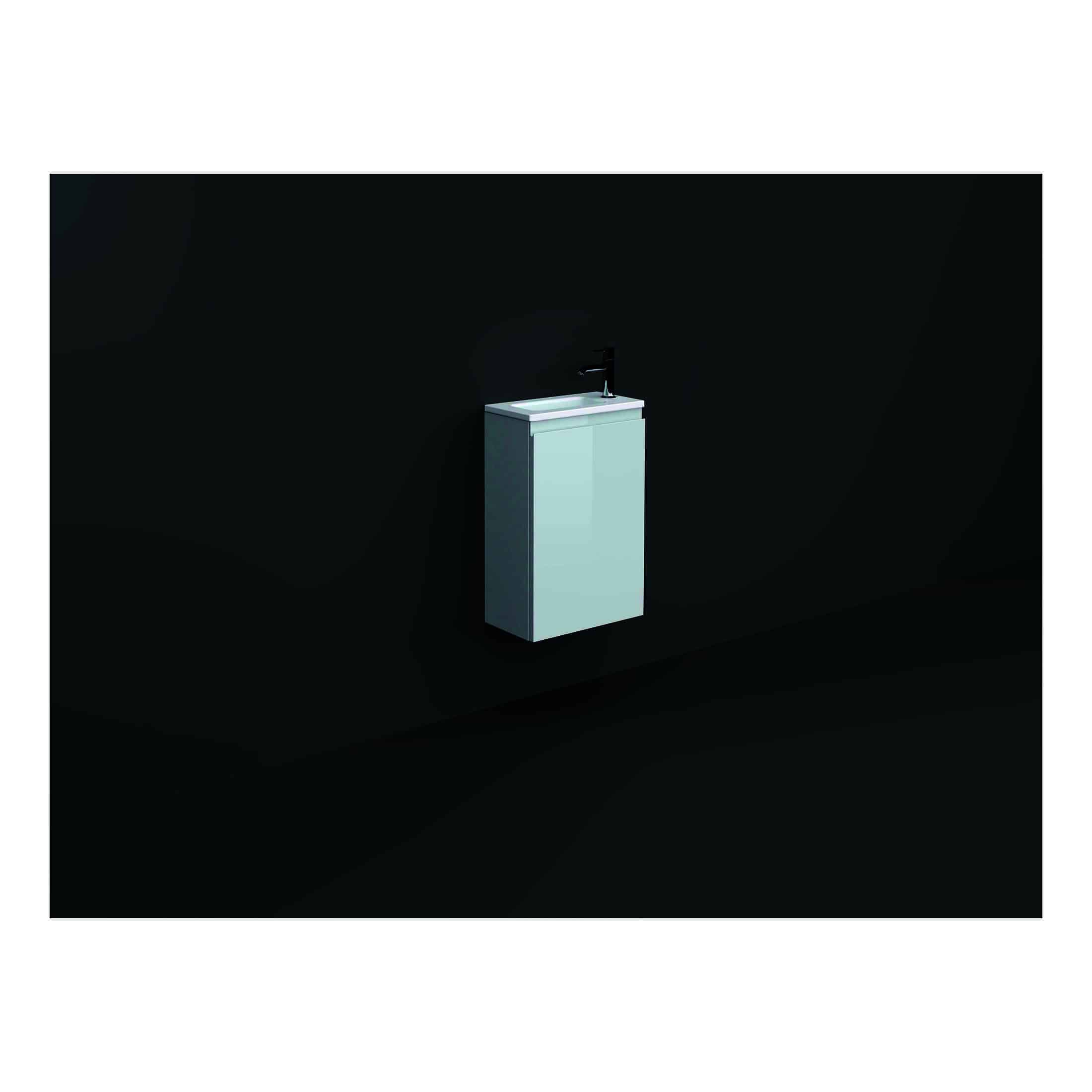 Minimalist bathroom sink unit with a sleek design and modern black tap, set against a dark background, perfect for contemporary bathroom décor.