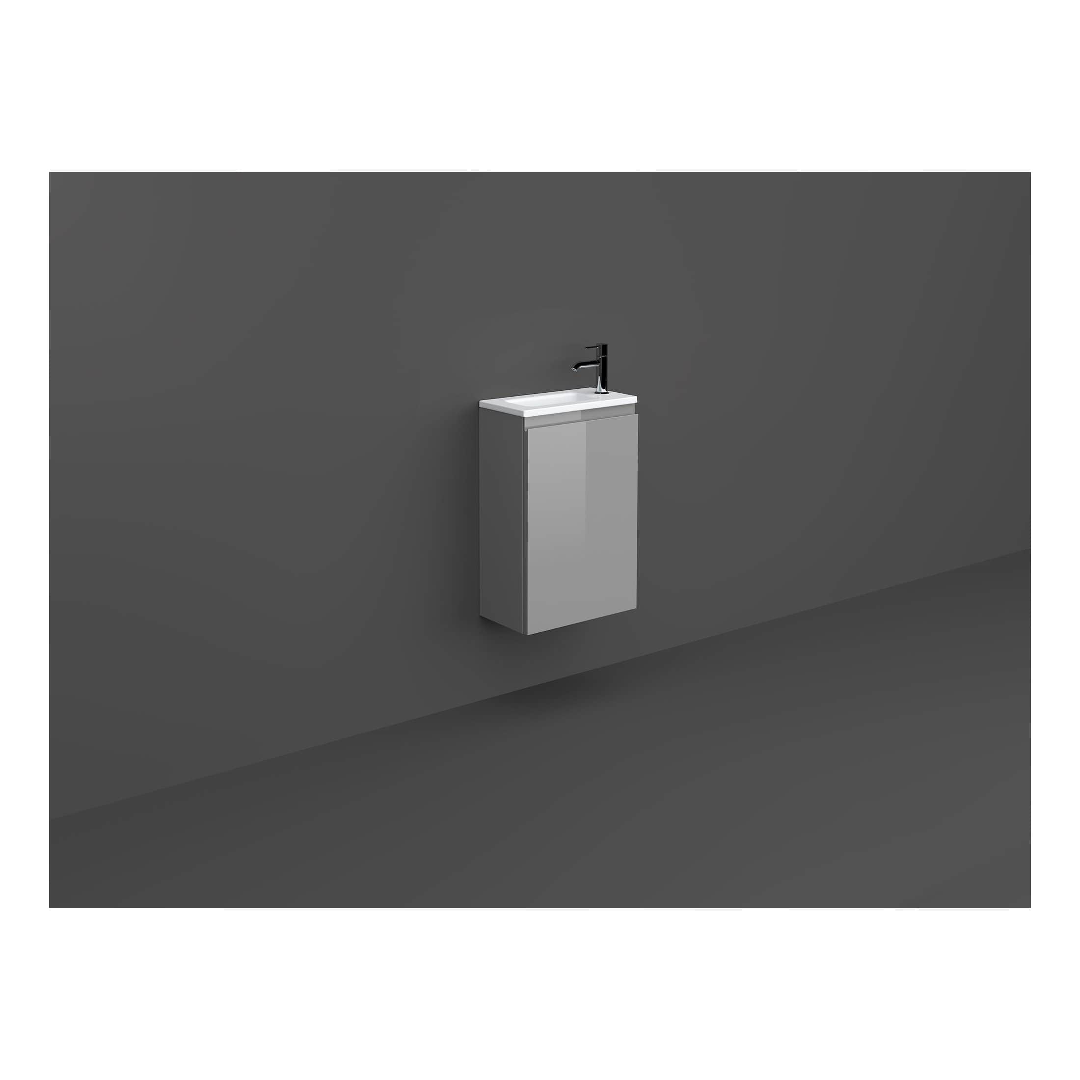 Slimline grey bathroom vanity with integrated sink and black faucet. Modern minimalist bathroom furniture, perfect for contemporary bathroom designs. Wall-mounted design for space-saving and sleek style.