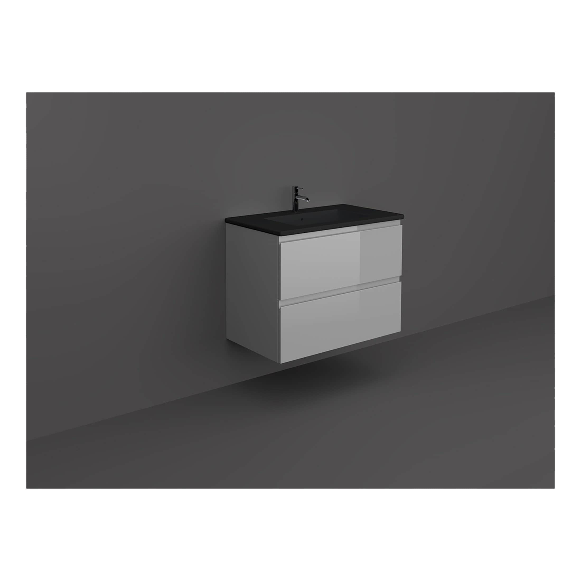 Modern bathroom vanity unit with black countertop and integrated sink, minimalist white design, suitable for contemporary bathroom interiors.