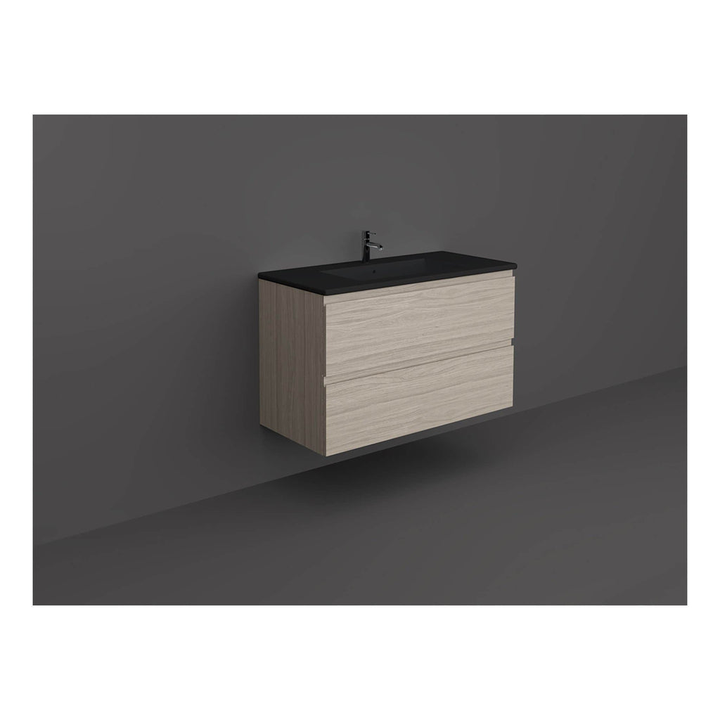 Sleek modern bathroom vanity with a black countertop and integrated sink, featuring light wood finish drawers, ideal for contemporary bathroom décor, stylish and functional.