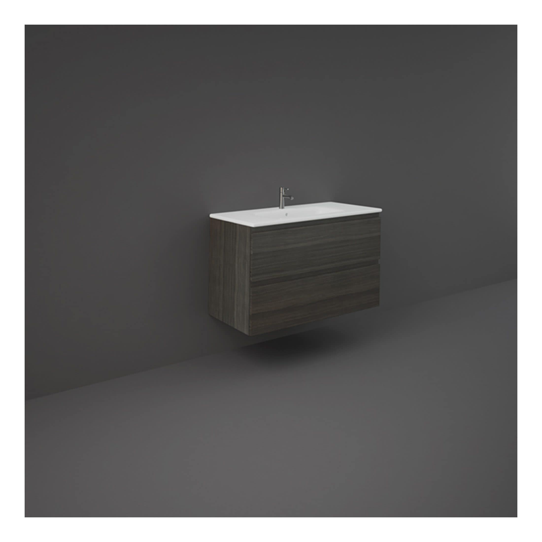 Modern wall-mounted bathroom vanity with a sleek white ceramic sink and dark wood finish, ideal for contemporary bathroom designs and space-saving solutions.