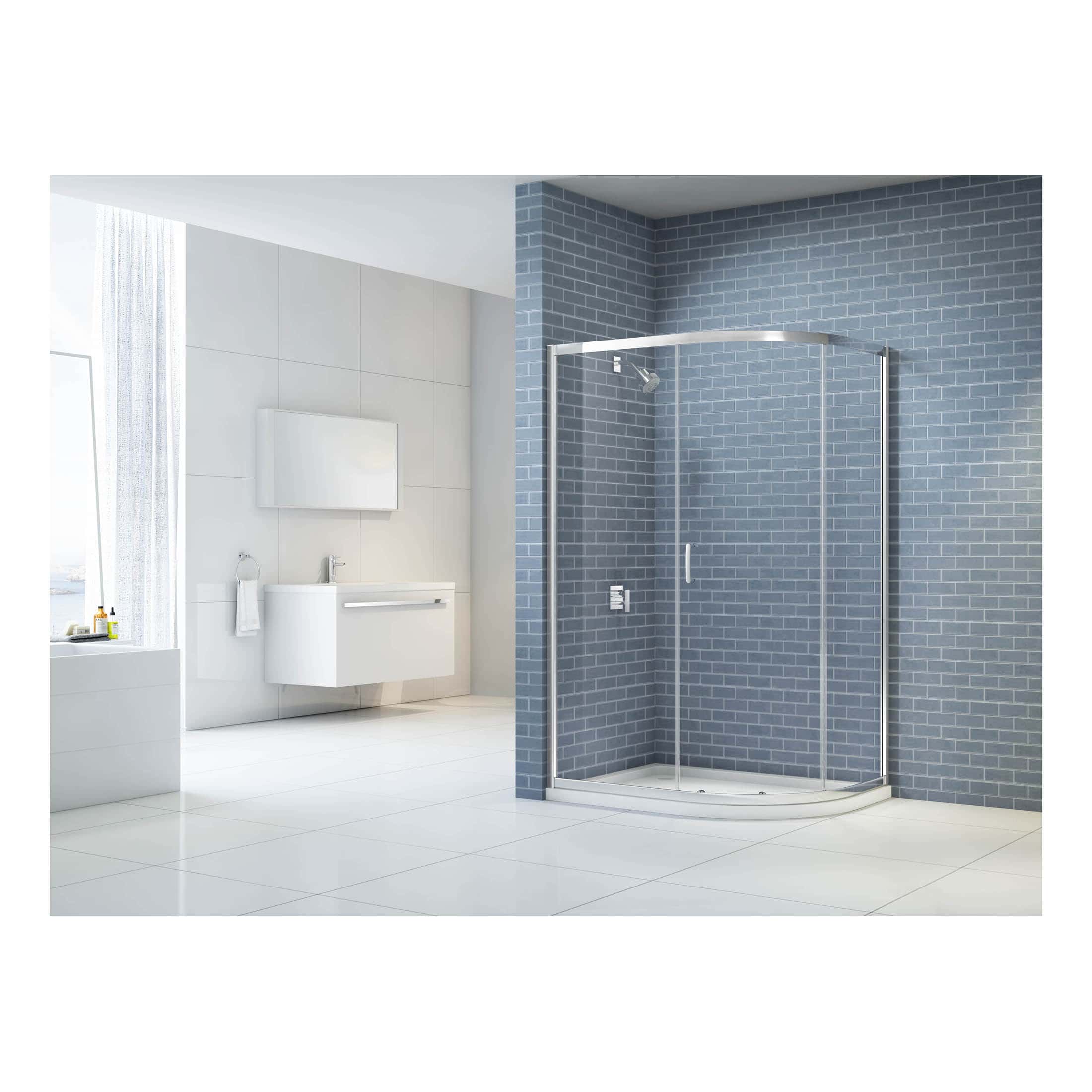 Modern shower enclosure with blue brick-style tiles, sleek chrome fixtures, and a spacious design, perfect for contemporary bathroom decor and water efficiency.
