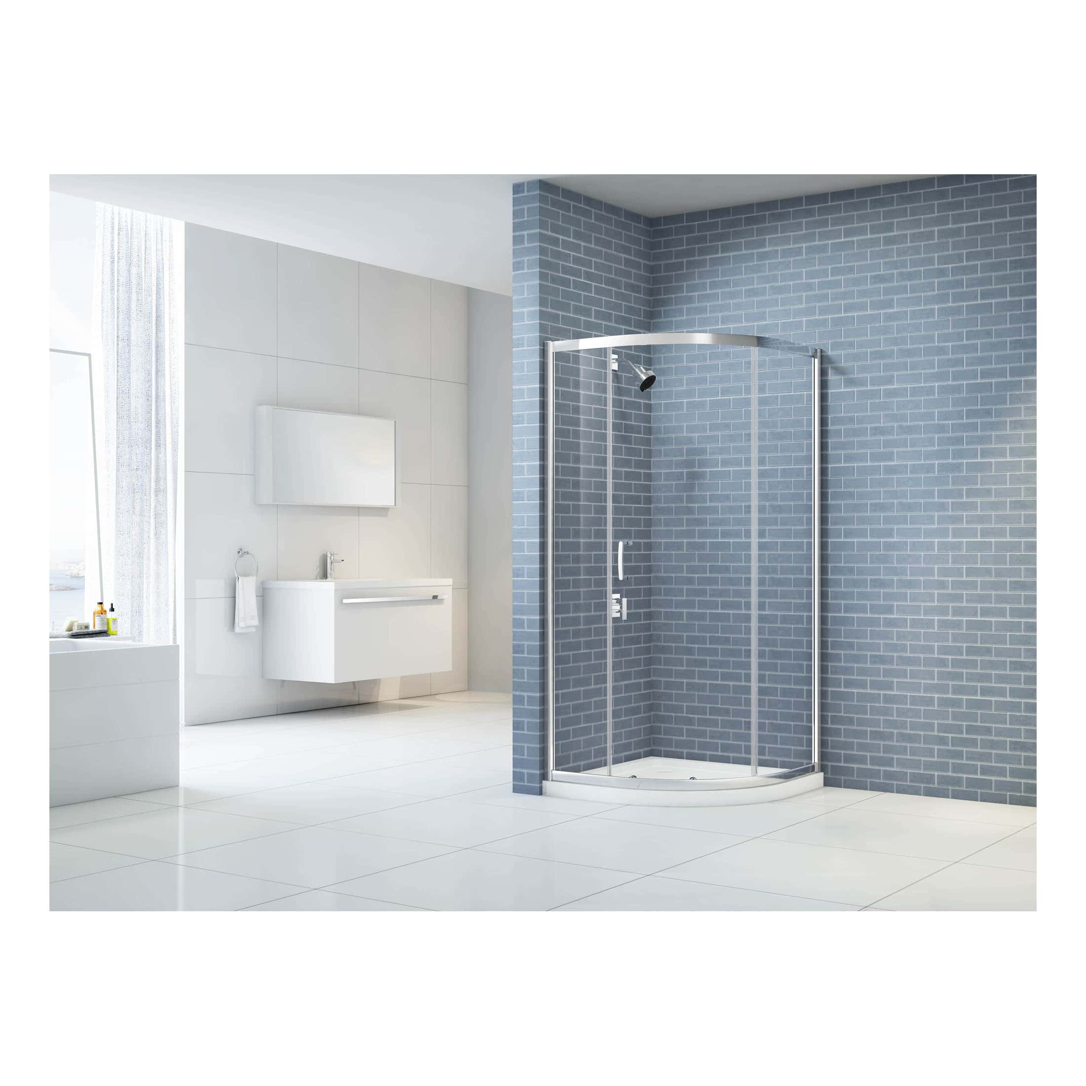 Shower enclosure with blue brick wall and modern bathroom cabinetry in a minimalist design.