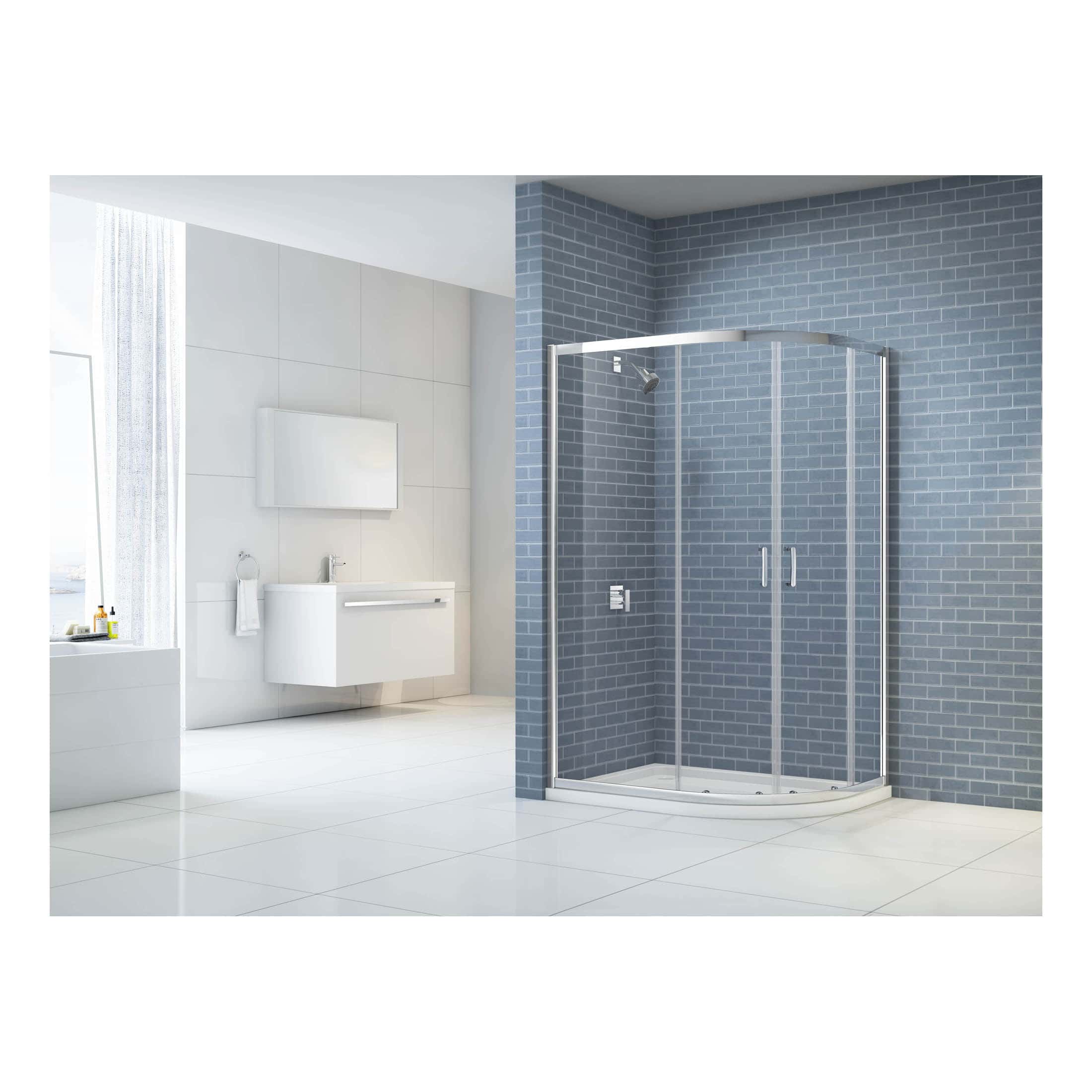 Modern corner shower enclosure with clear glass doors in a contemporary bathroom setting. Stylish blue brick wall and sleek white fixtures create a clean, minimalistic look.