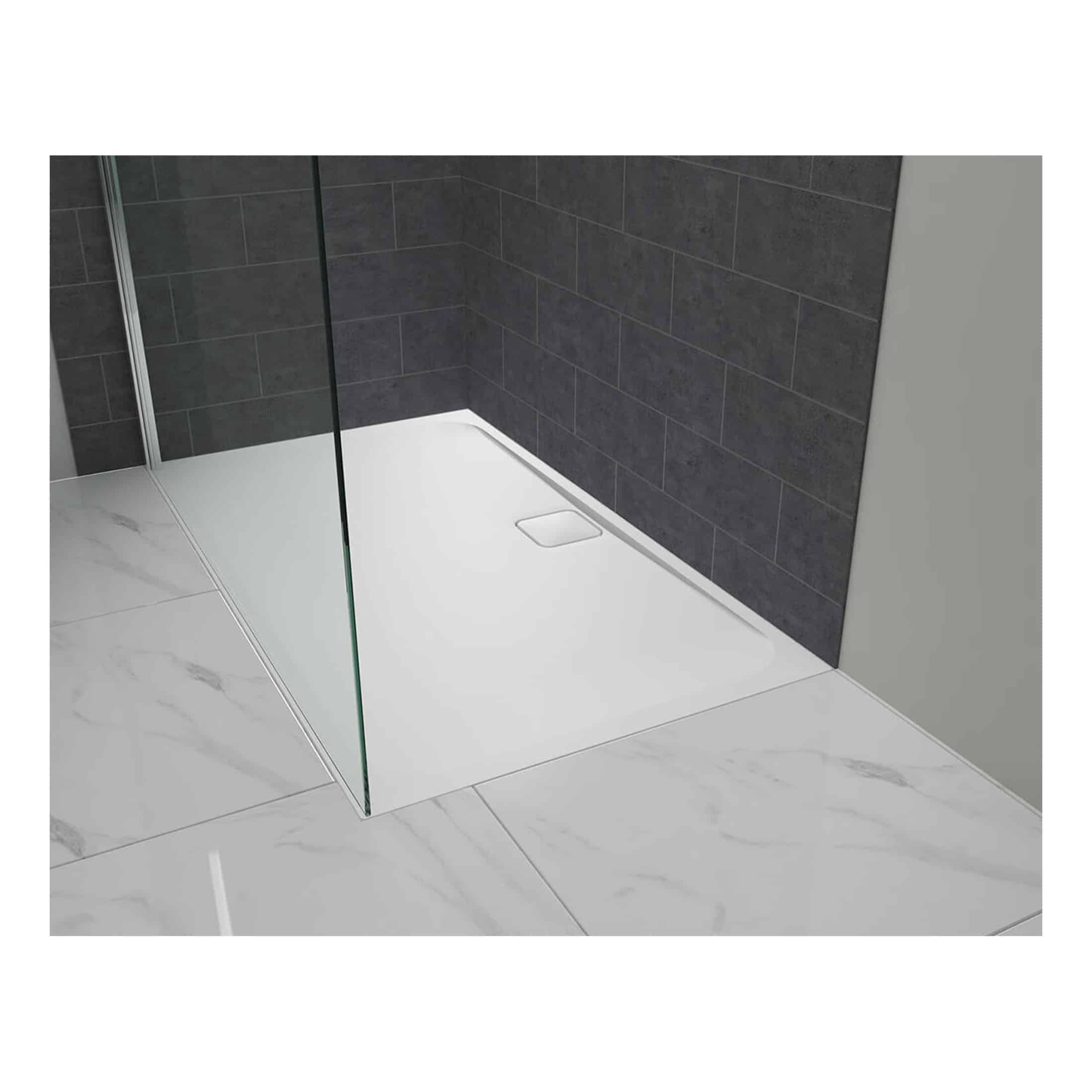 Modern walk-in shower with glass partition and dark grey tiled wall at Bubly Bathrooms.