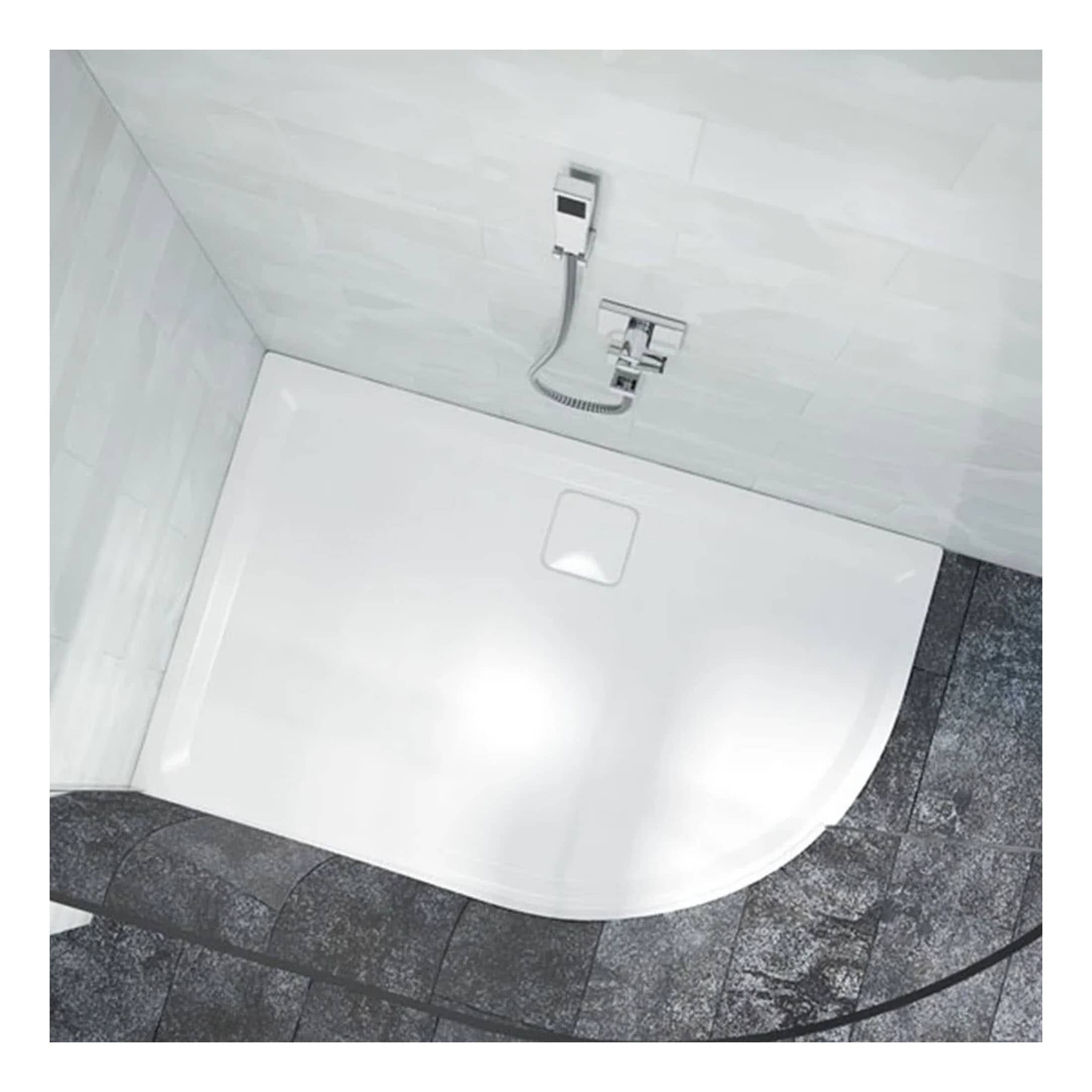 Shower tray with modern plumbing fixtures and grey tiled floor, designed for stylish and functional bathroom renovation.