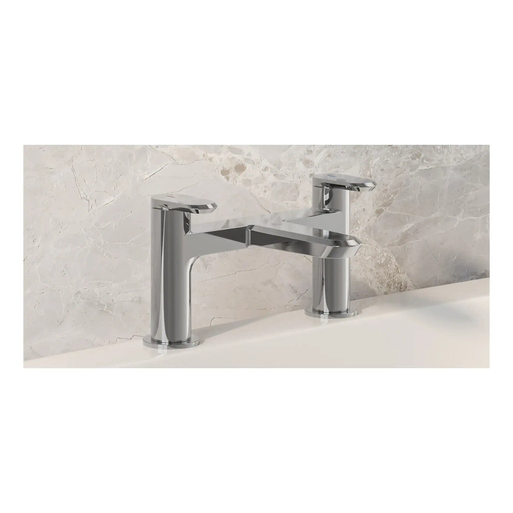 Sleek modern chrome bathroom tap with dual handles, designed for stylish and functional bathroom sinks, showcasing quality craftsmanship and contemporary design.